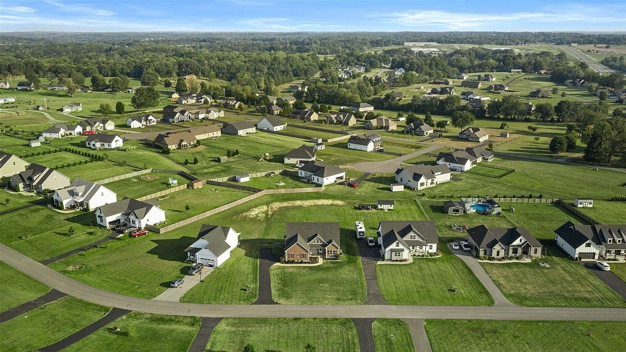 Aerial view of the Cornerstone neighborhood with single-family homes and green lawns