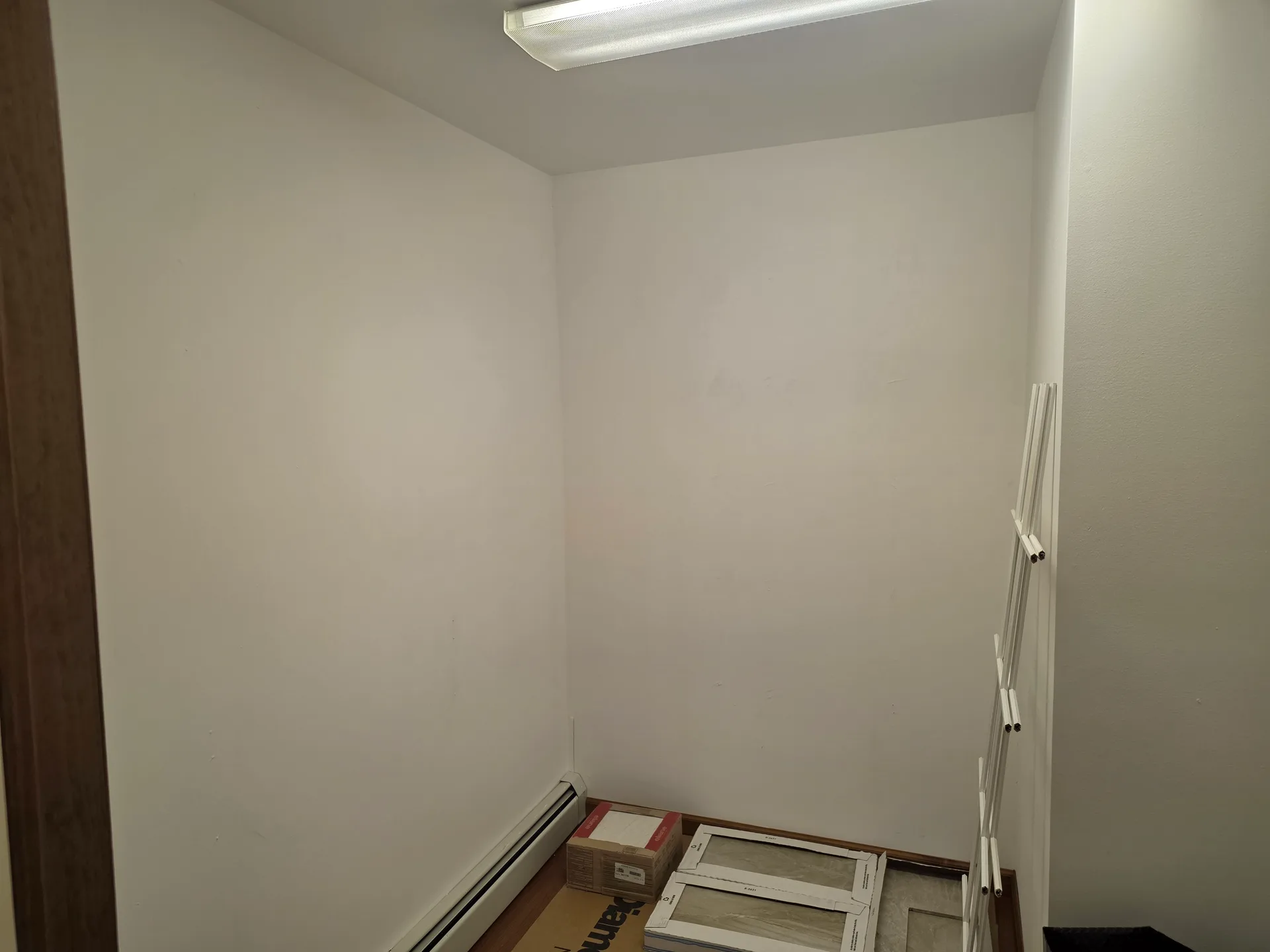Walk-in closet with shelving and storage space