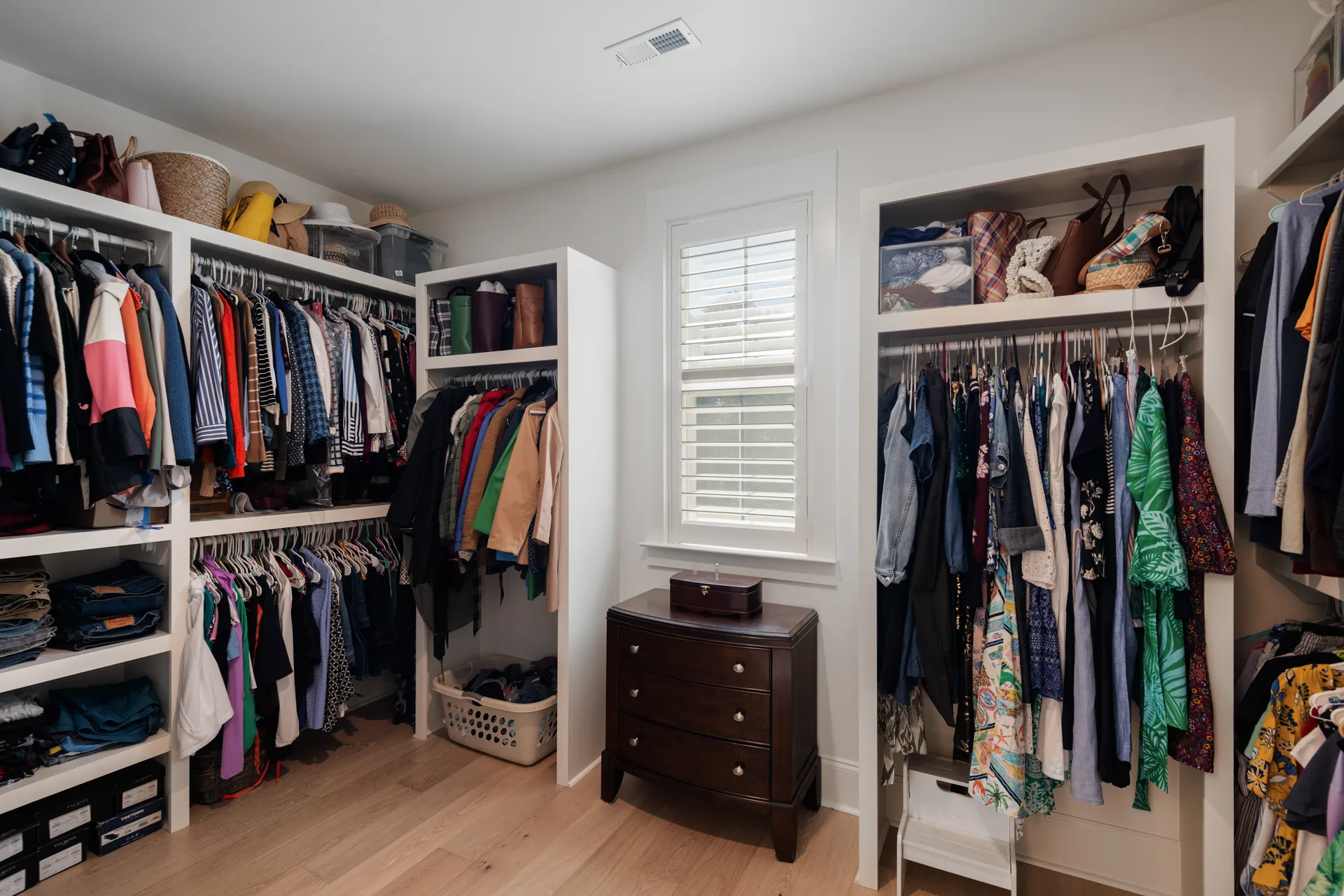 Primary closet with added shelving