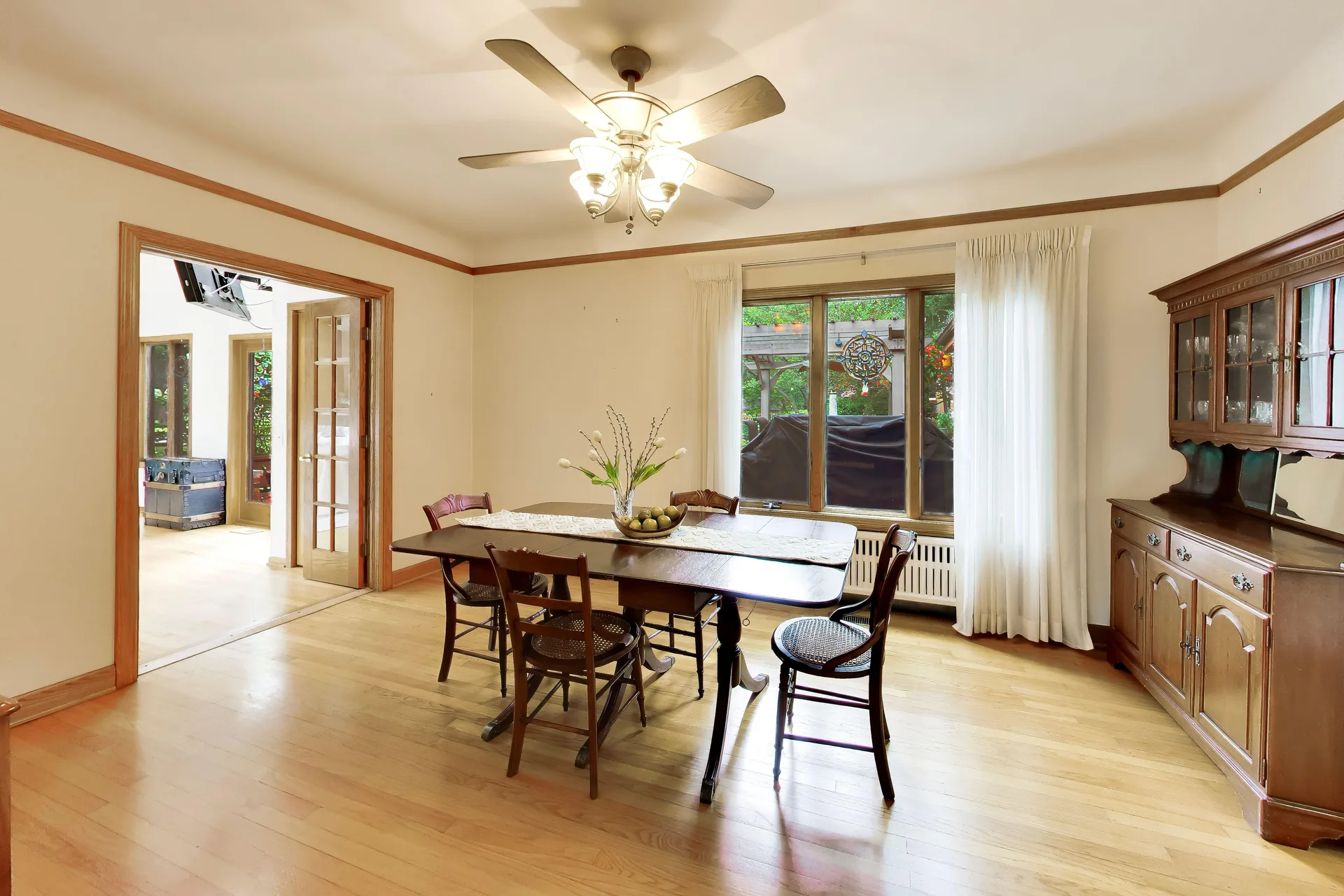Dining room with hardwood floors and window light