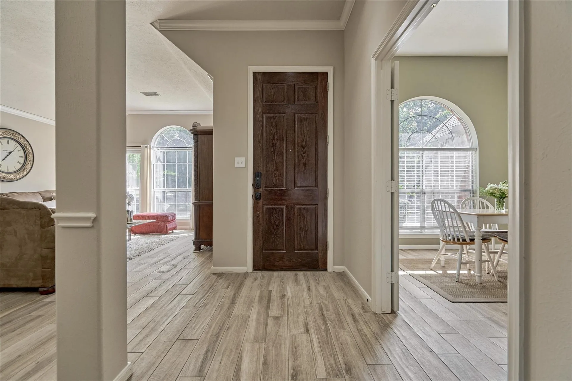 Front foyer and entry with dark wood front door