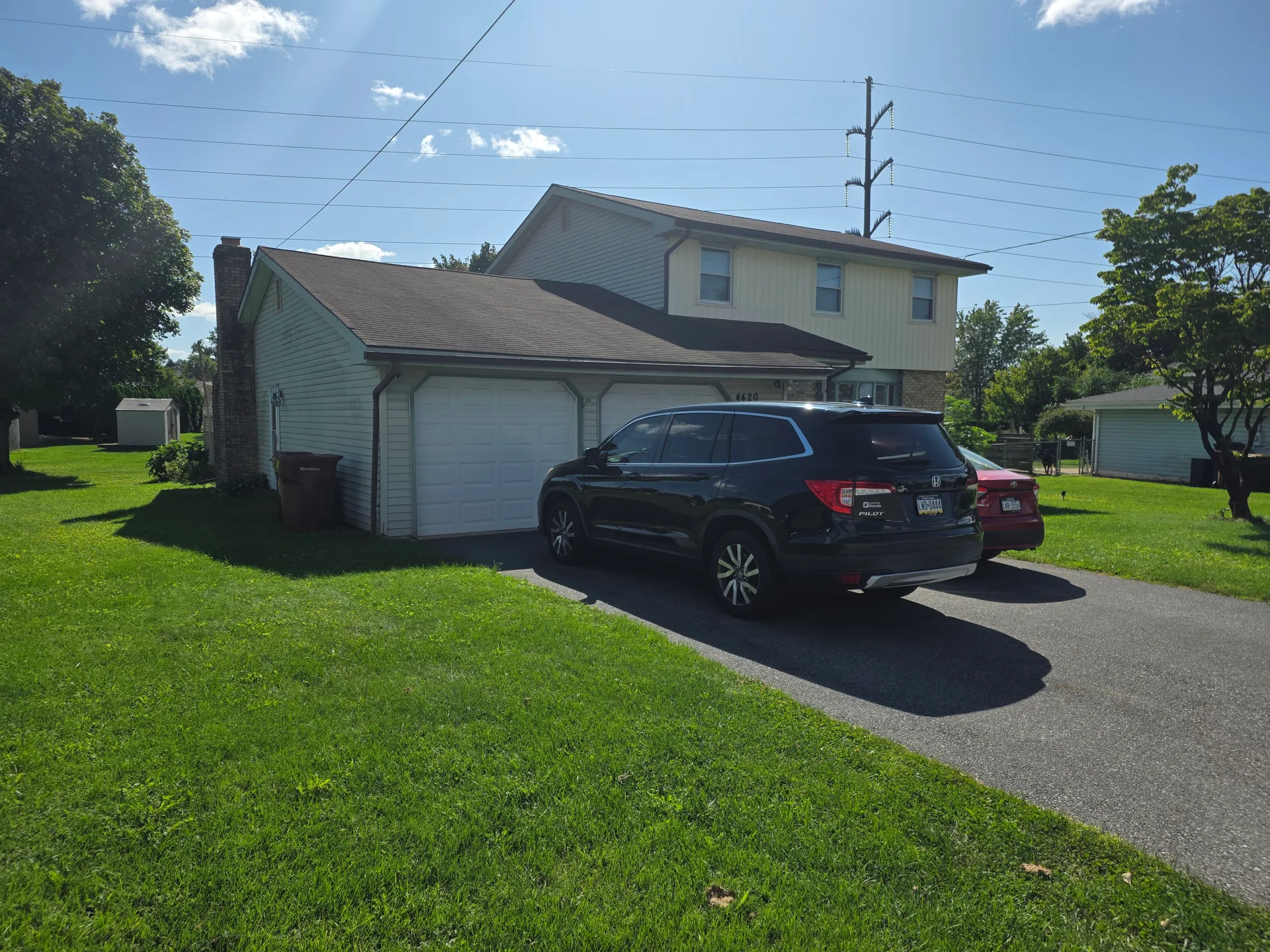 Facade and driveway of the home at 4420 Phillip Street