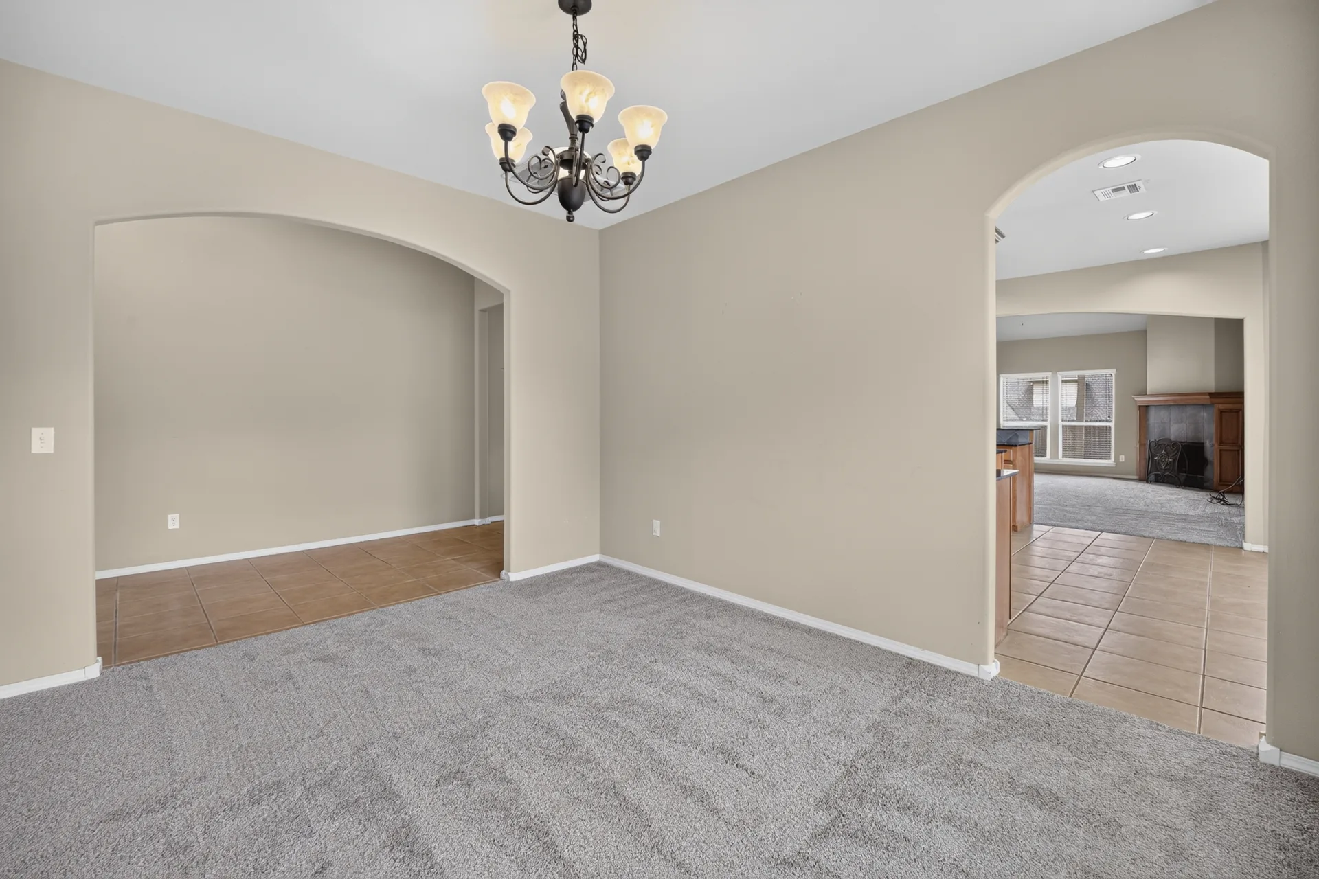 Formal dining room with archways