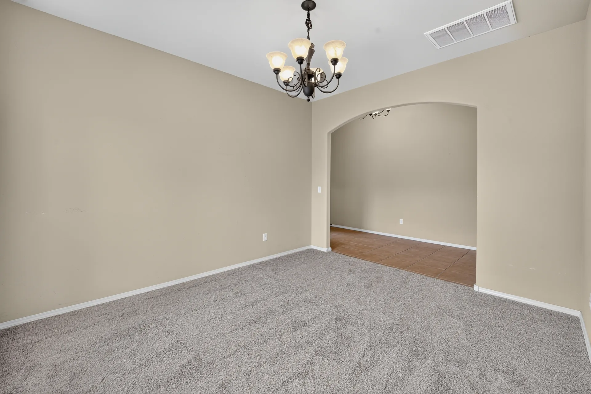 Dining room with arched entry