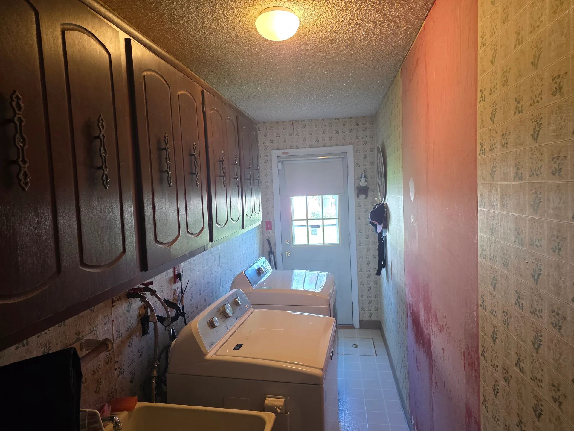 Laundry room with cabinetry