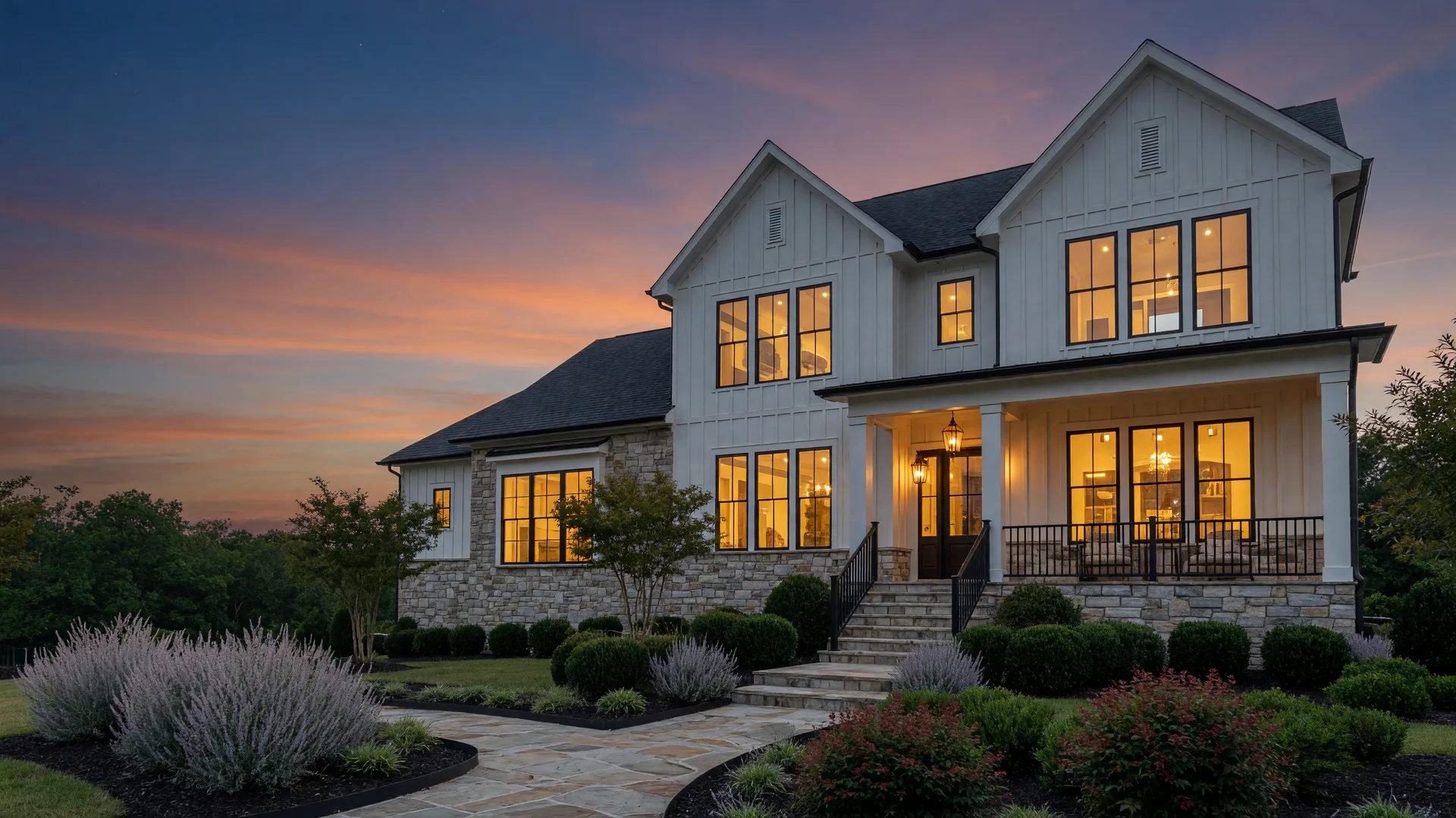 A design-forward Tri Pointe Homes property with modern farmhouse styling glowing warmly at twilight in a Virginia community