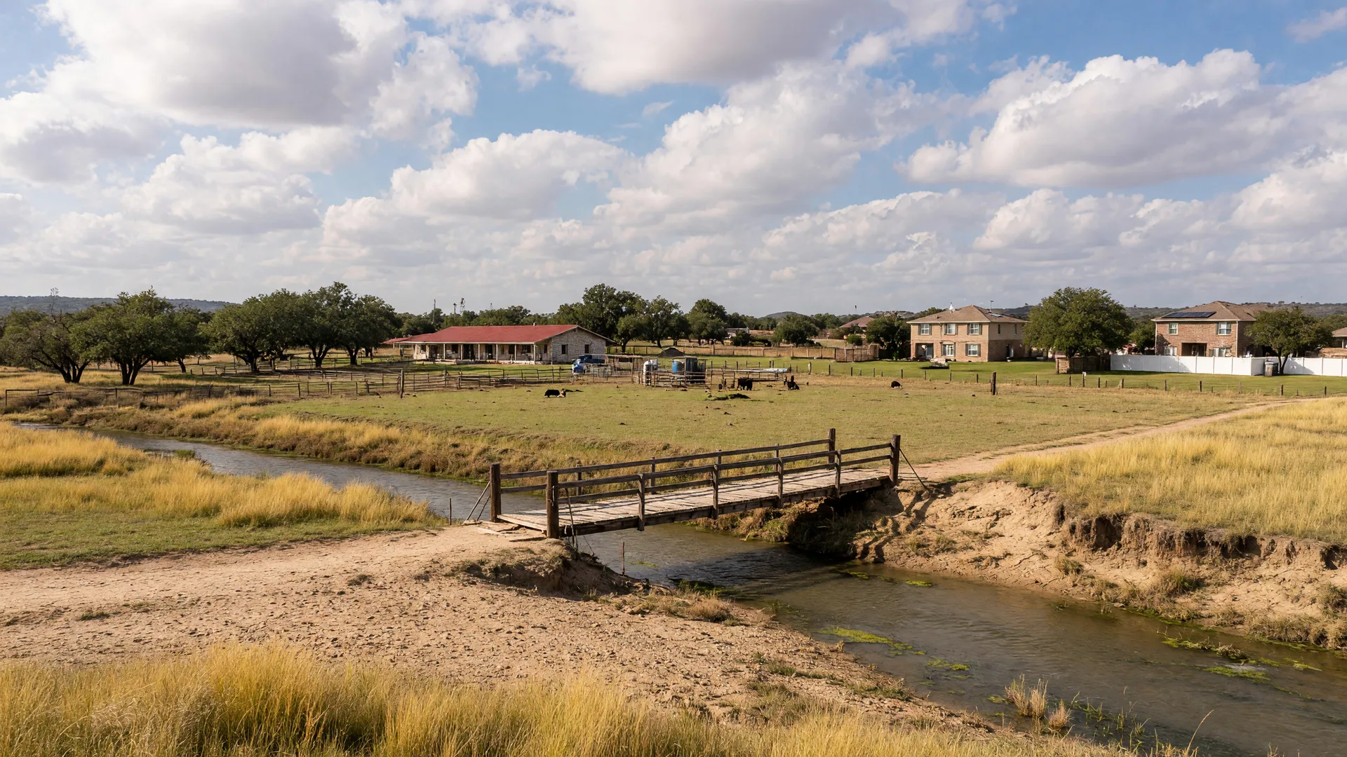 Illustrative image of a creek winding through ranch country near Cross Creek Ranch