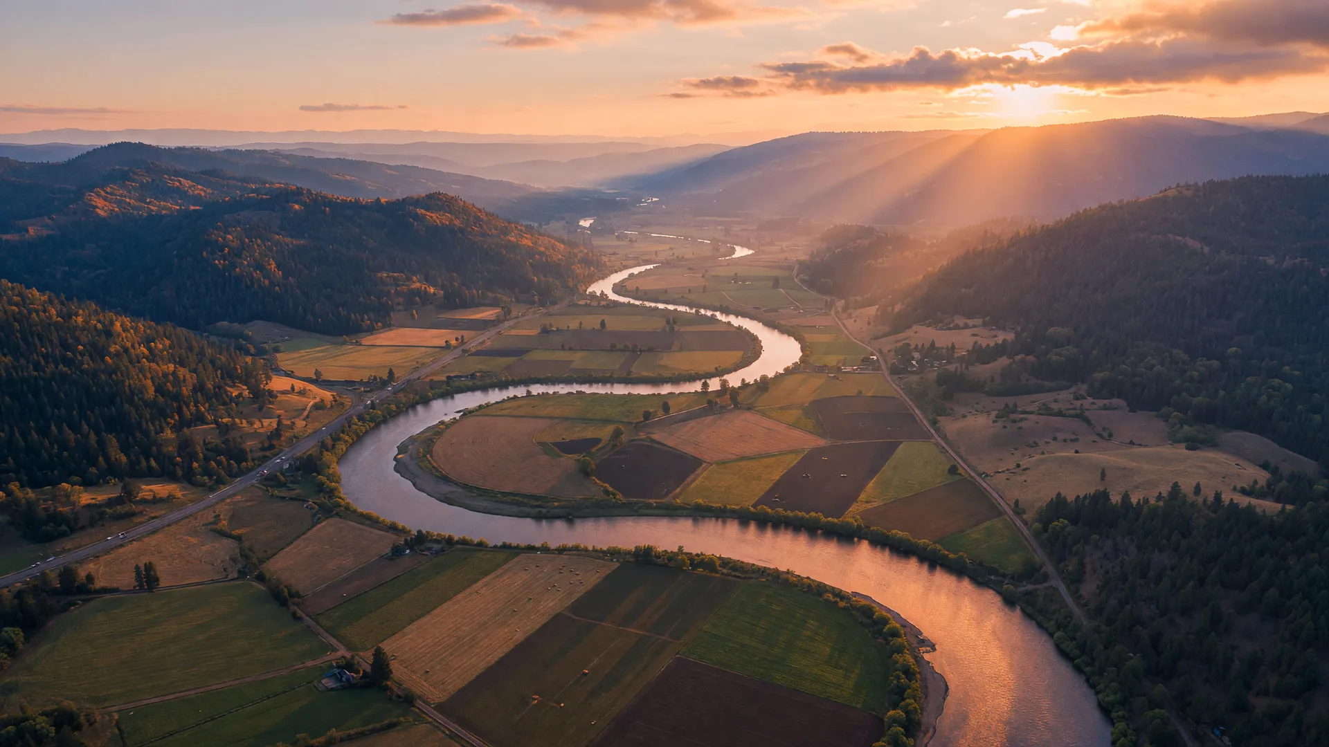 Aerial drone view of the Rogue River valley in Southern Oregon at golden hour