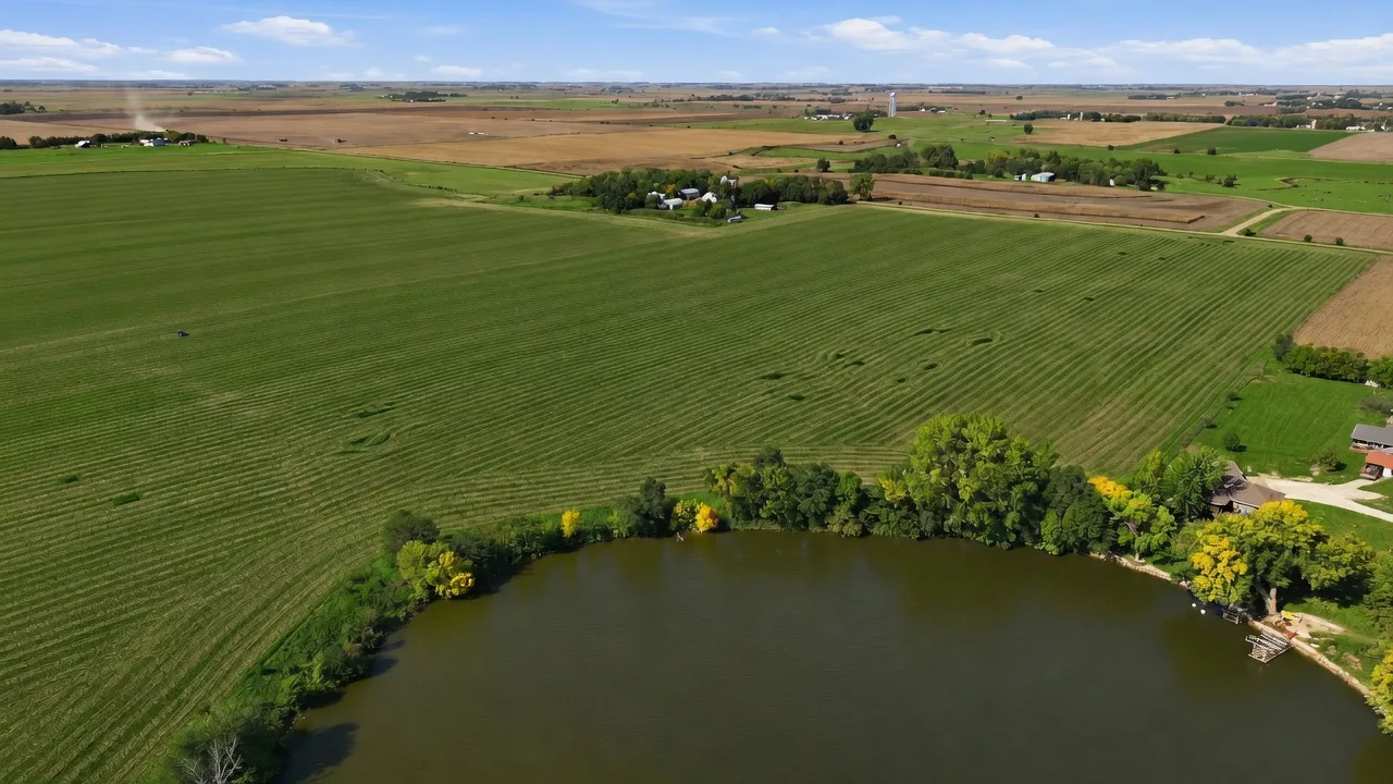Aerial view of the 2.5149-acre lot with Swan Lake shoreline in the distance