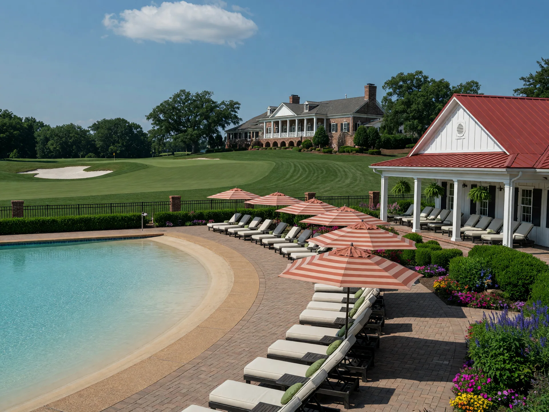 Resort-style outdoor pool terrace at Heritage Hunt in Gainesville VA with loungers and clubhouse views