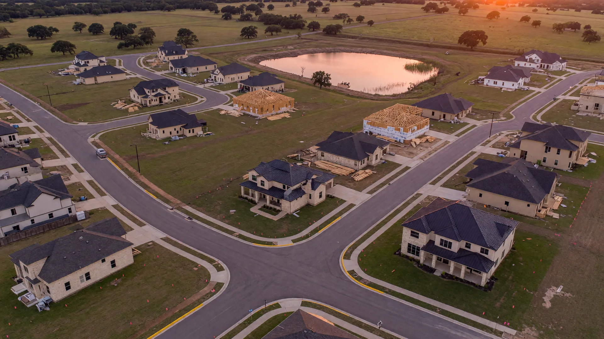 Representative aerial view of a North Texas one-acre homesite development with new luxury homes and lots in early construction