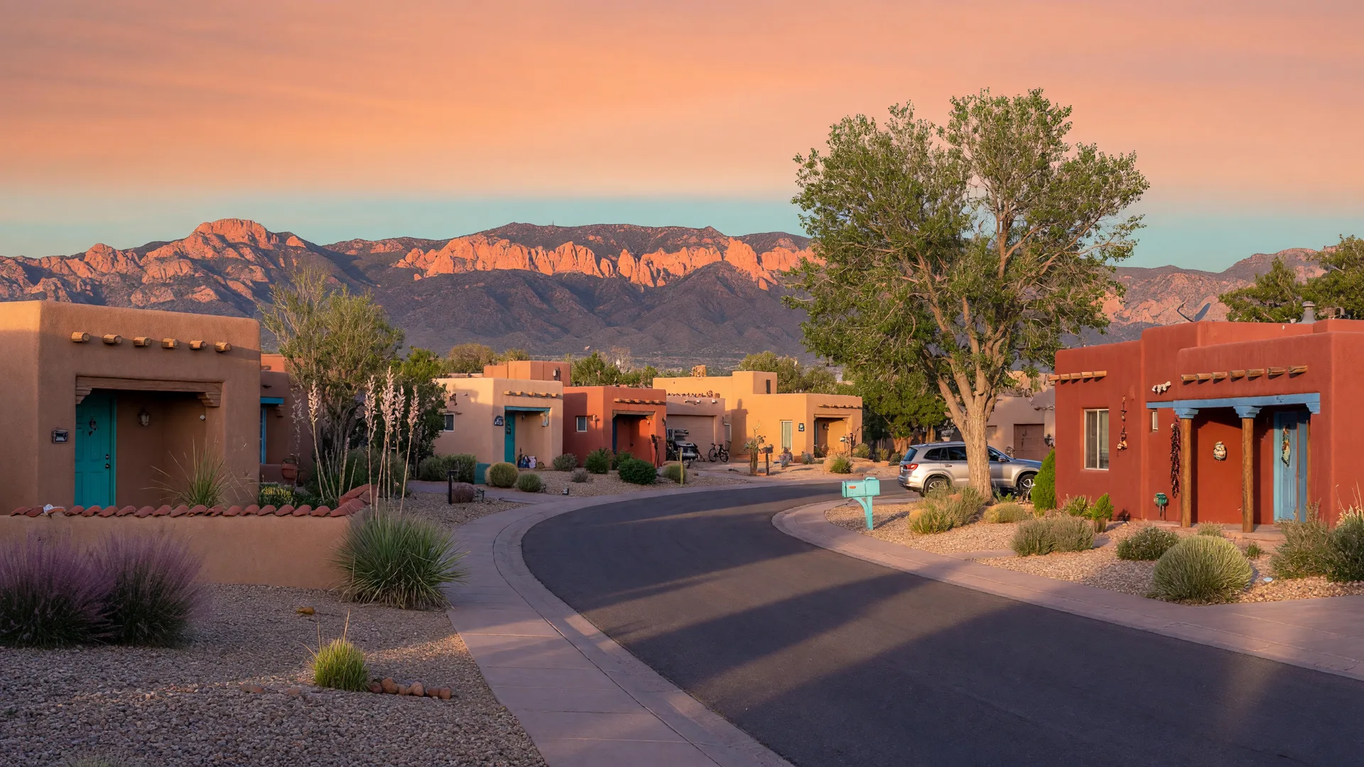 Quiet Albuquerque residential neighborhood with Pueblo-style homes and Sandia Mountains
