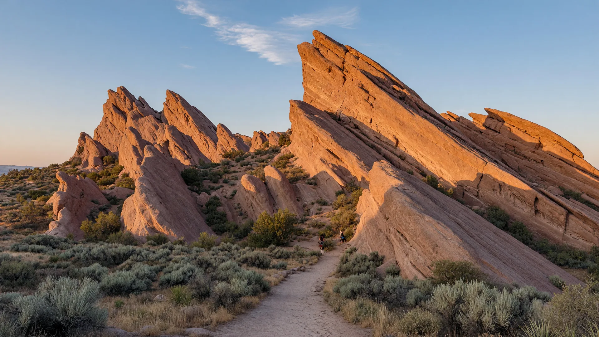 Towering tilted sandstone slabs at Vasquez Rocks Natural Area in Agua Dulce catching golden-hour light