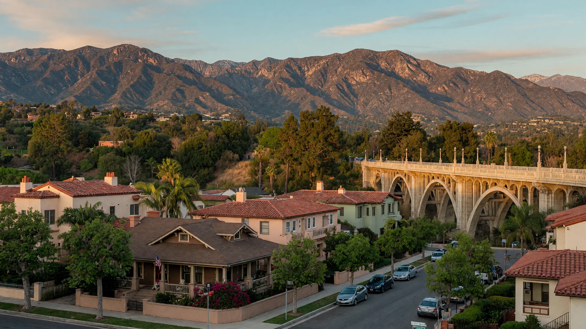 Pasadena homes and terracotta rooftops with the San Gabriel Mountains in the background