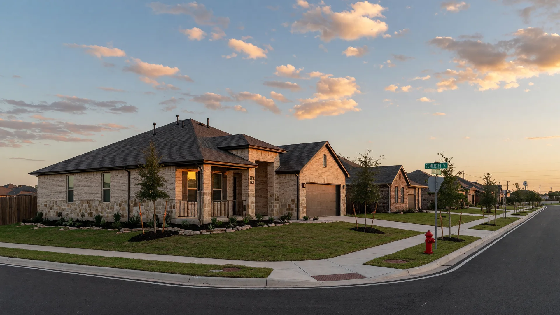 A newer single-story brick subdivision home in southwest Bexar County near Somerset, Texas under a big Texas sky, in the home inspection service area of Rodeo Home Inspections