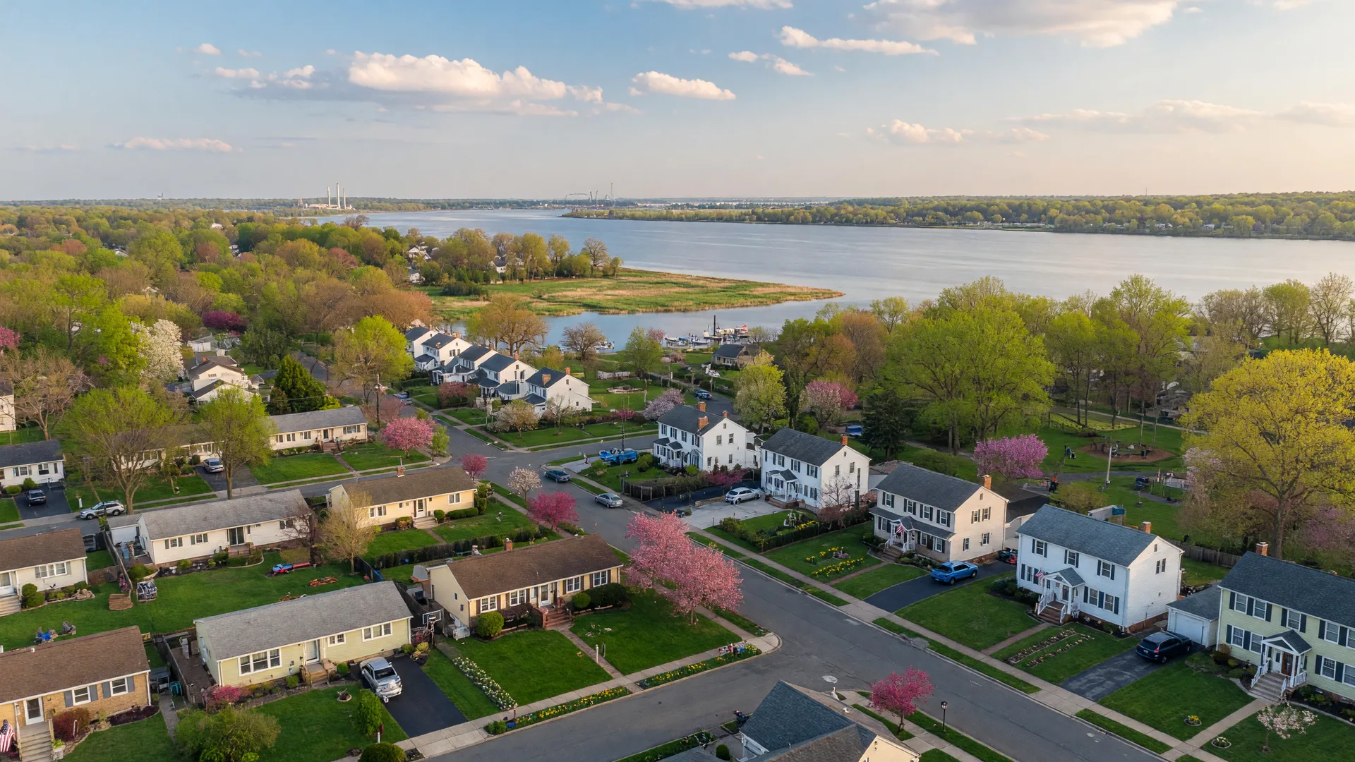 Aerial view of Delran, New Jersey showing tree-lined suburban streets and the Delaware River