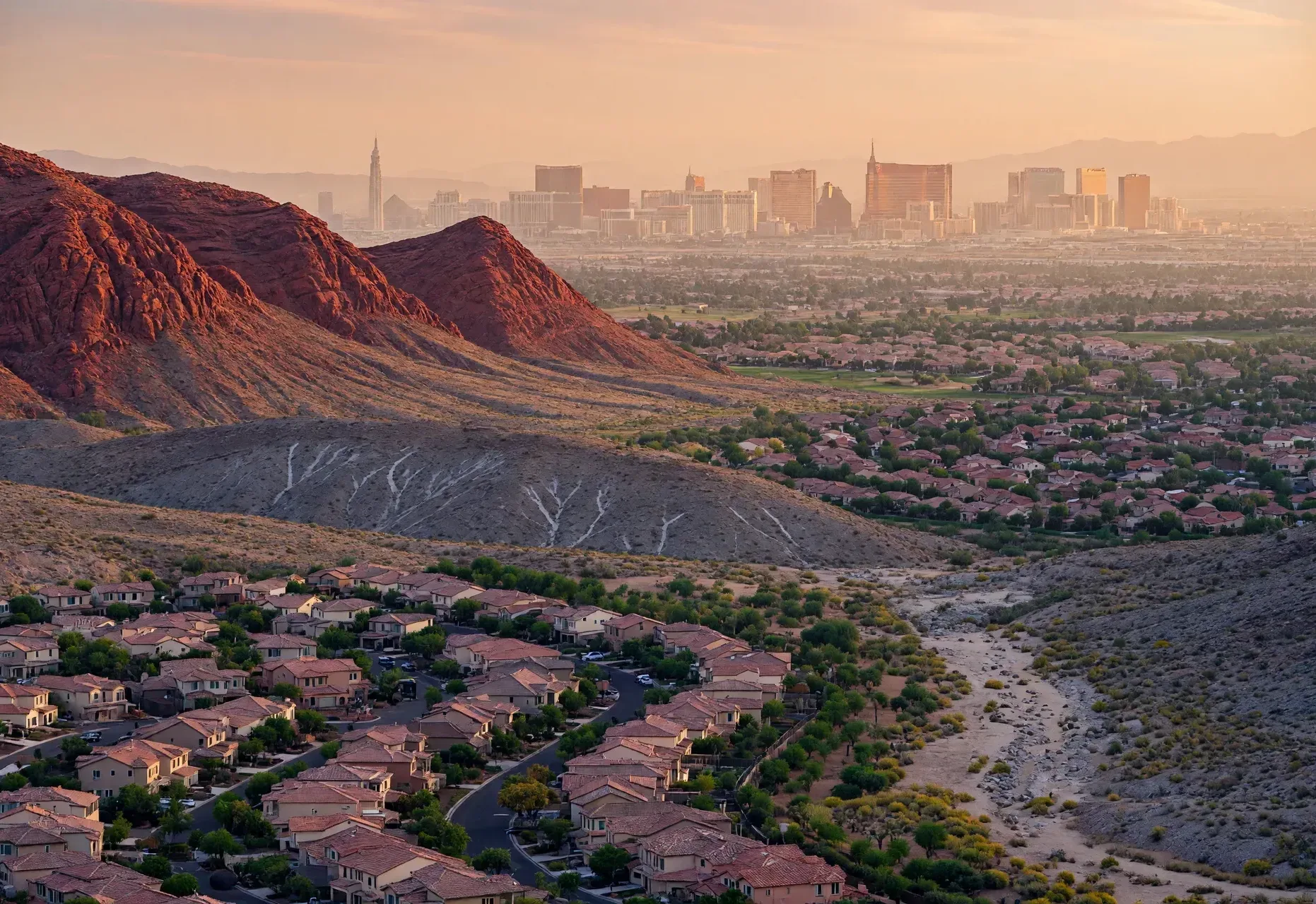 Las Vegas valley and Red Rock Canyon foothills seen from a Summerlin overlook at late afternoon