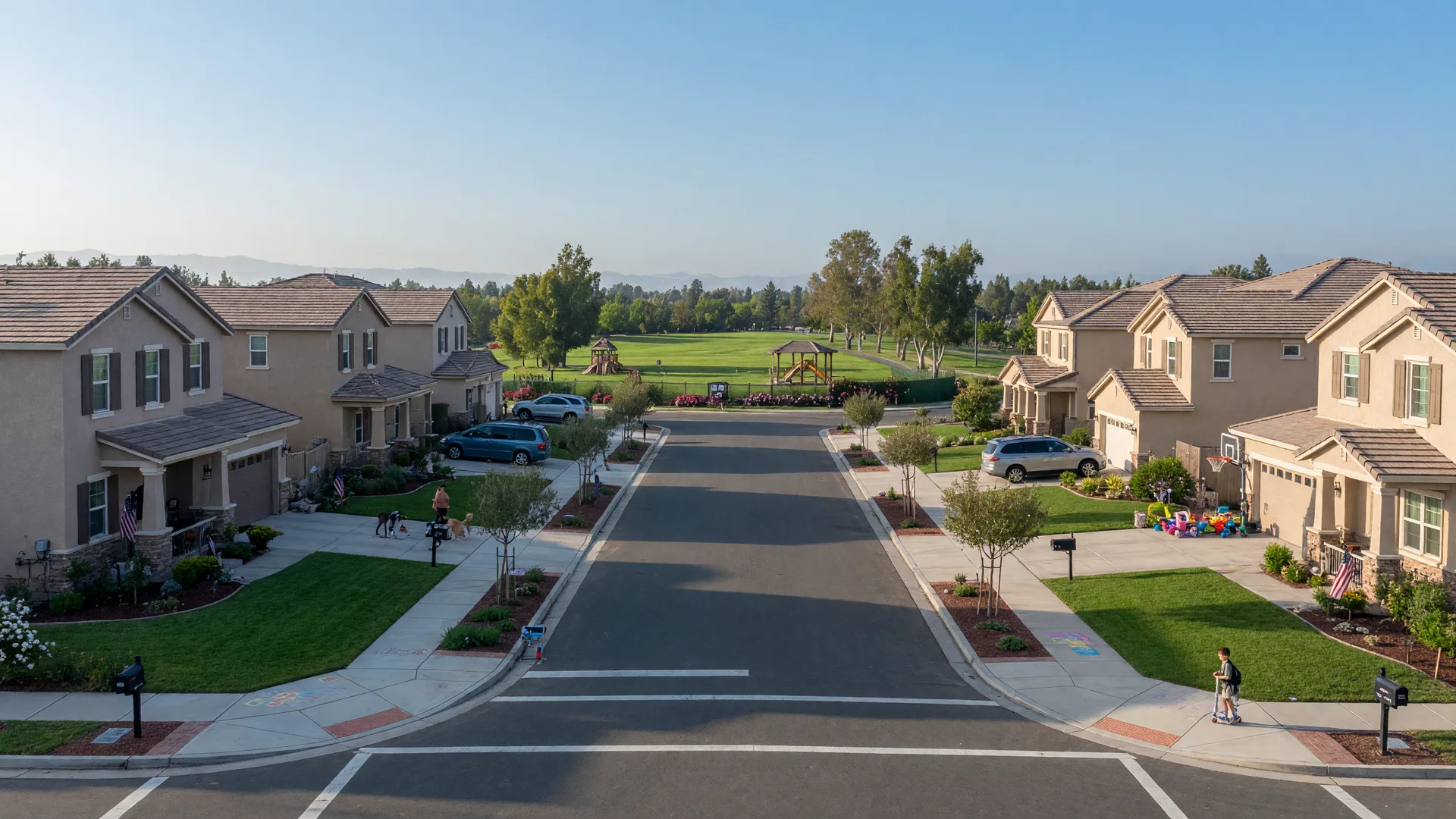 A clean, family-friendly Clovis suburban street on a bright September morning
