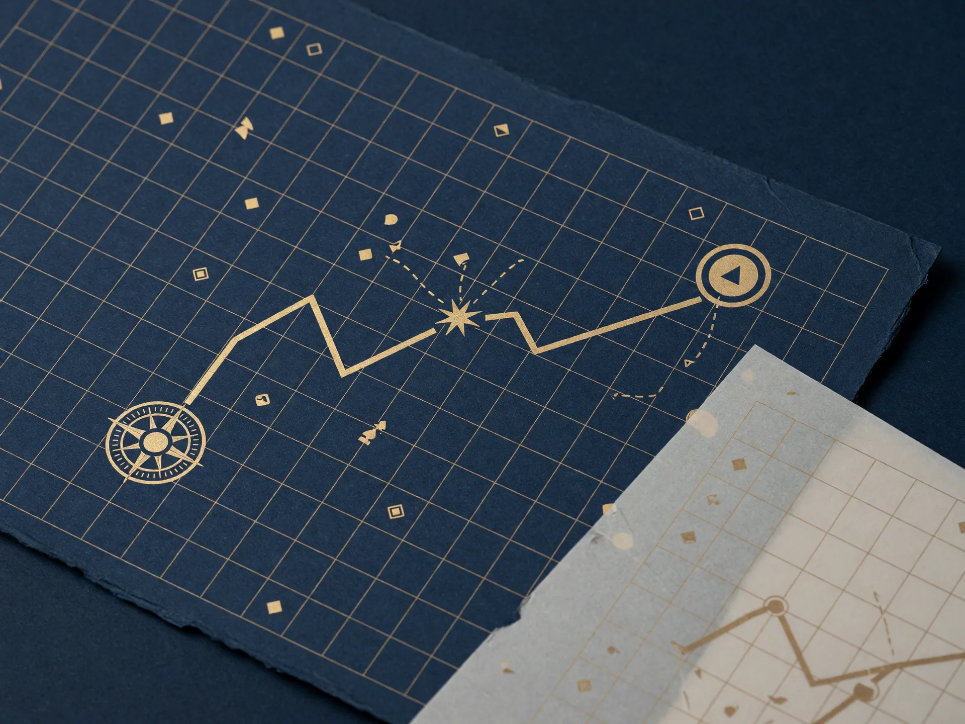 A navigation-style map on deep navy paper with a gold coordinate grid and a gold route line from an origin mark through a decision point to a destination