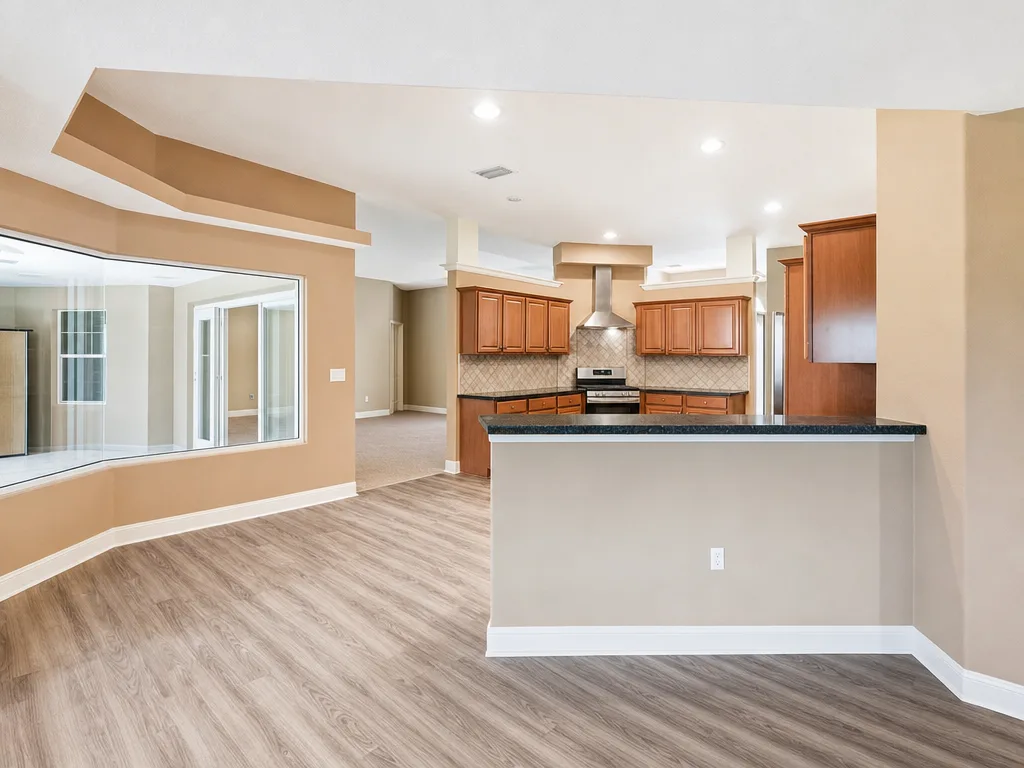 Open-concept kitchen and dining area with island seating