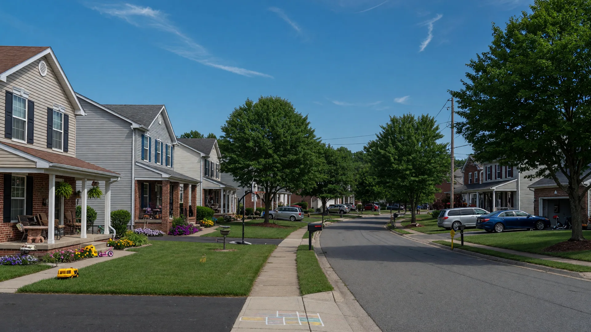 Quiet suburban street with newer brick-accent homes in Sinking Spring, Pennsylvania
