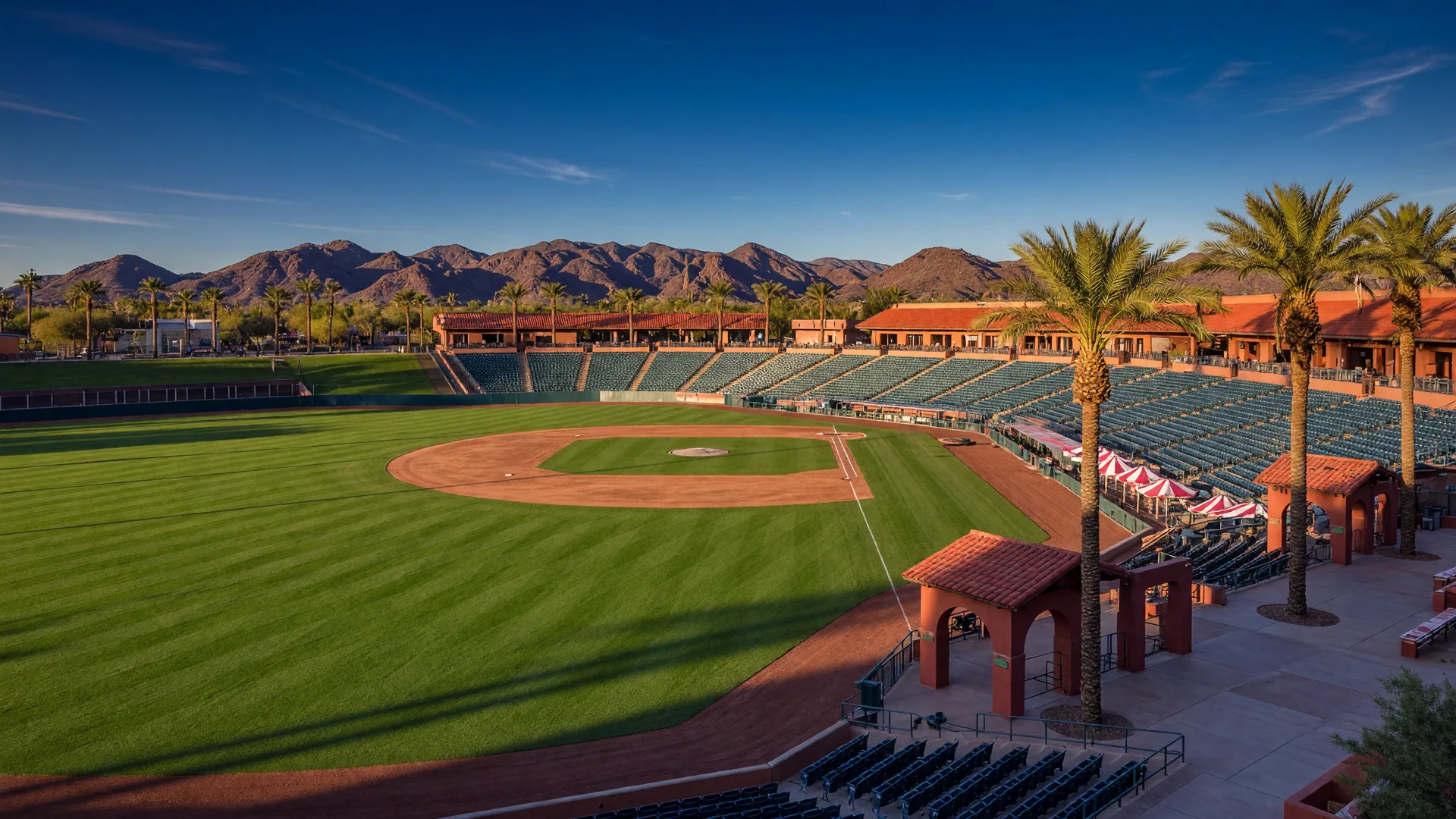 Spring training baseball stadium in the Arizona desert with mountains in the background
