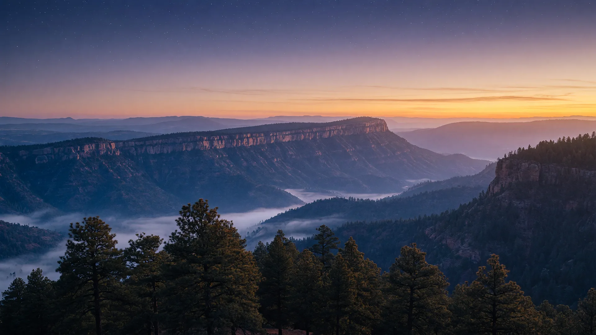 Ridgelines of the Mogollon Rim at dusk above Payson, Arizona