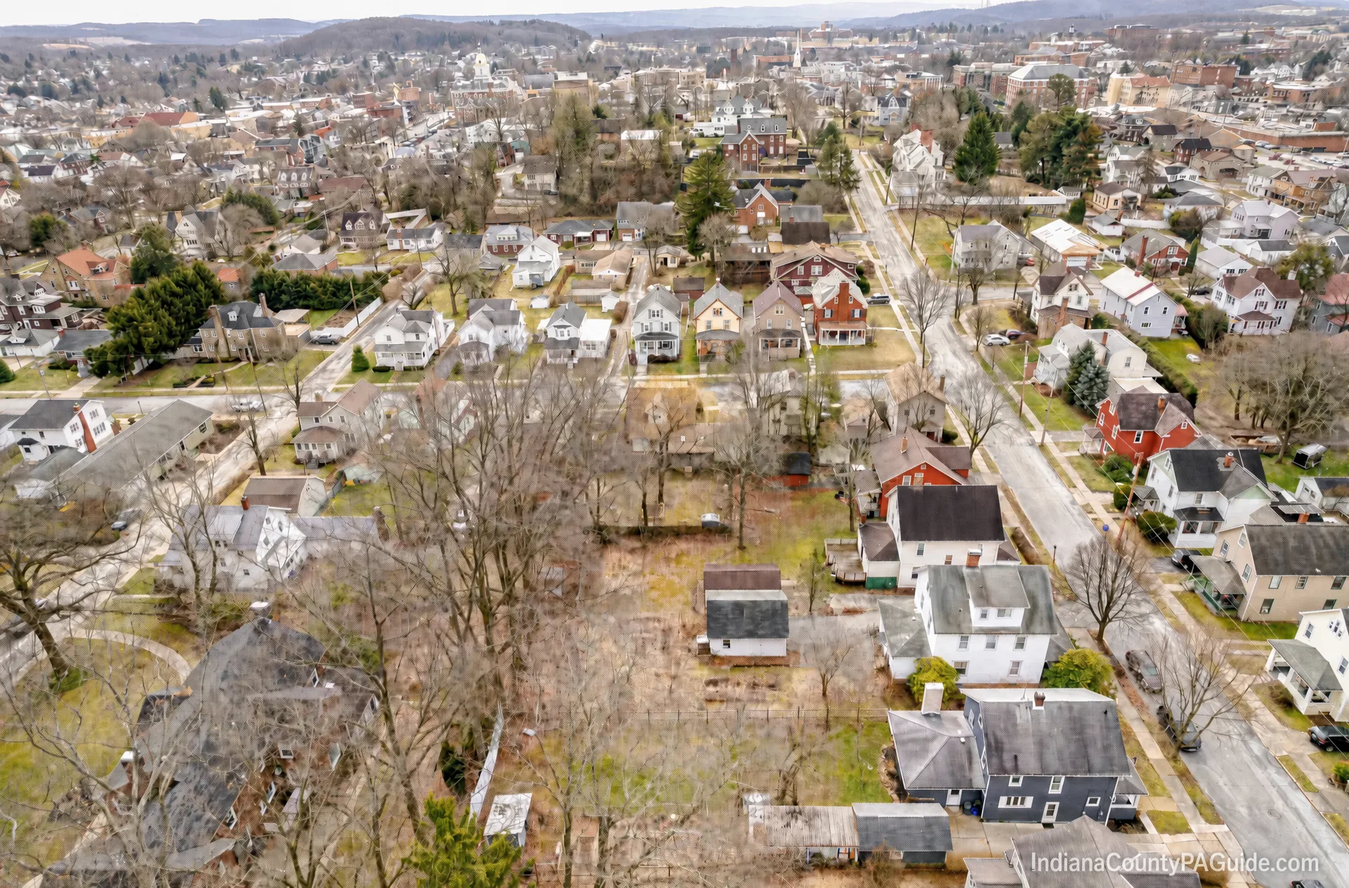 Aerial view of a residential neighborhood in Indiana, PA during winter