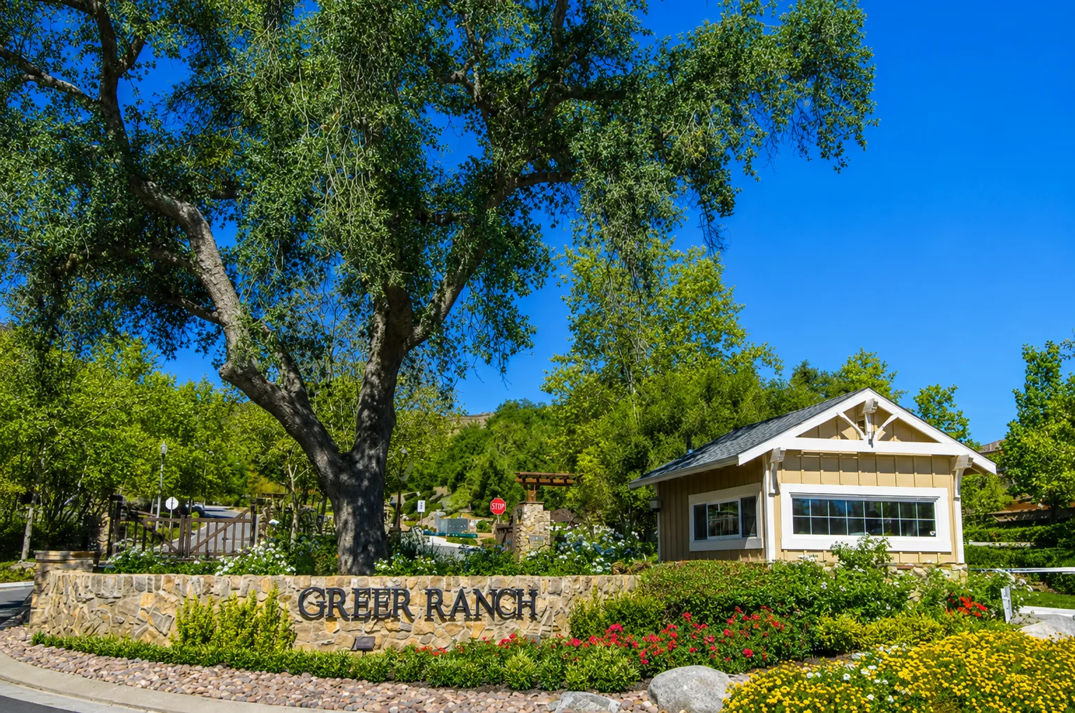 Stone entrance sign for the Greer Ranch gated community in Murrieta, California