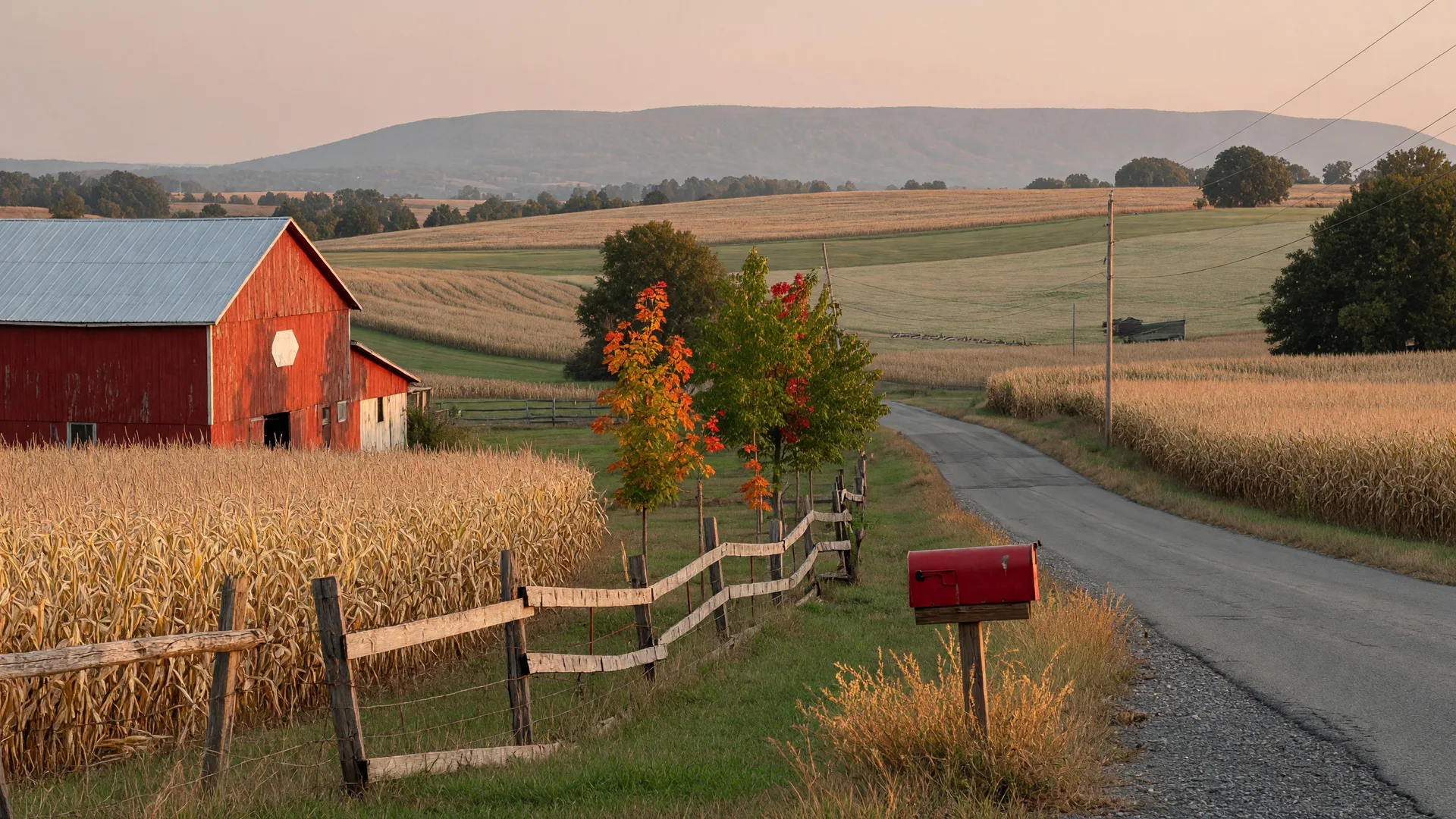 Golden mid-September light on a rural Lehigh Valley road with the Blue Mountain ridge on the horizon