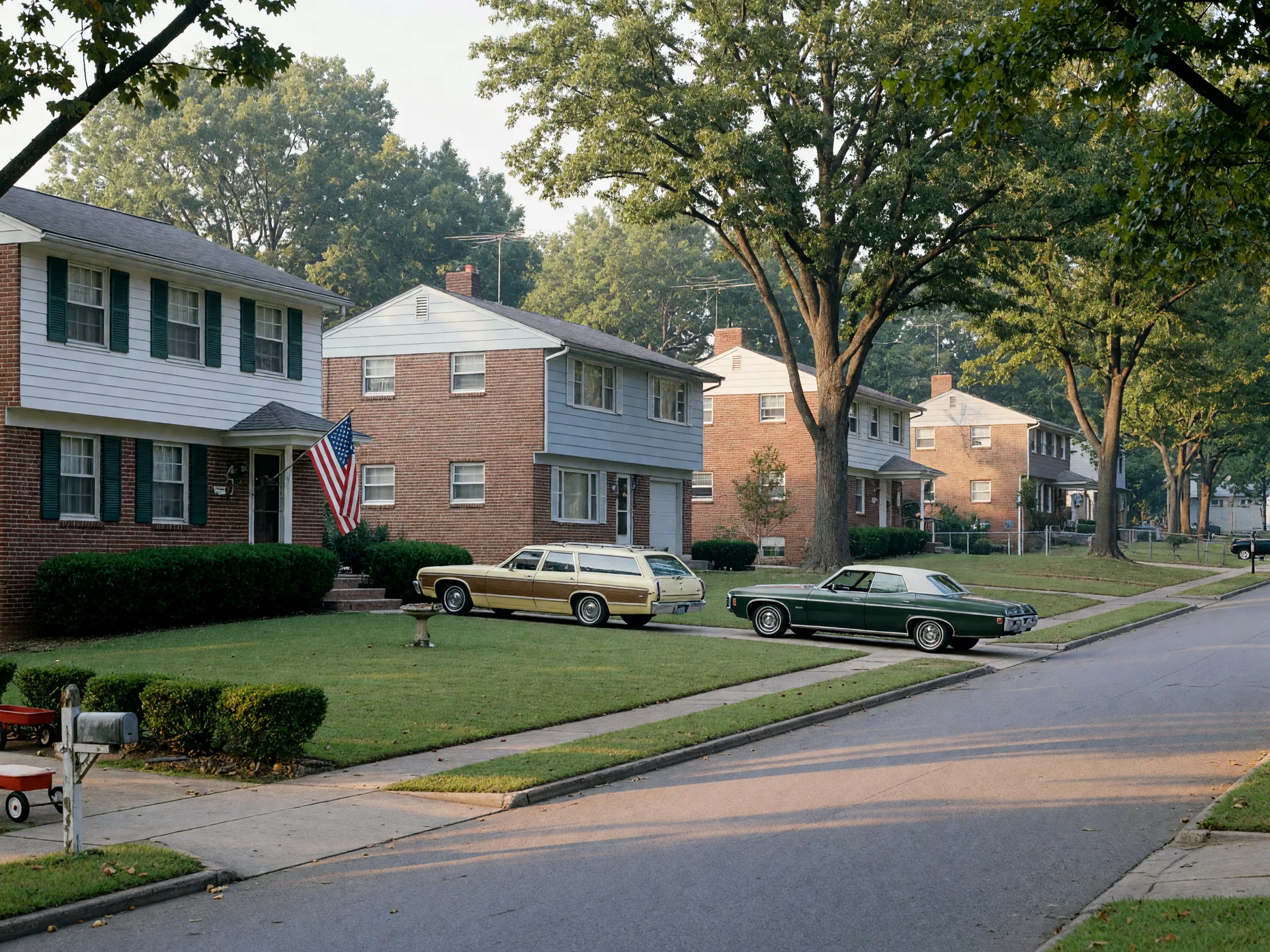 A quiet street of brick Colonials with manicured lawns and mature oaks in Triangle, Virginia