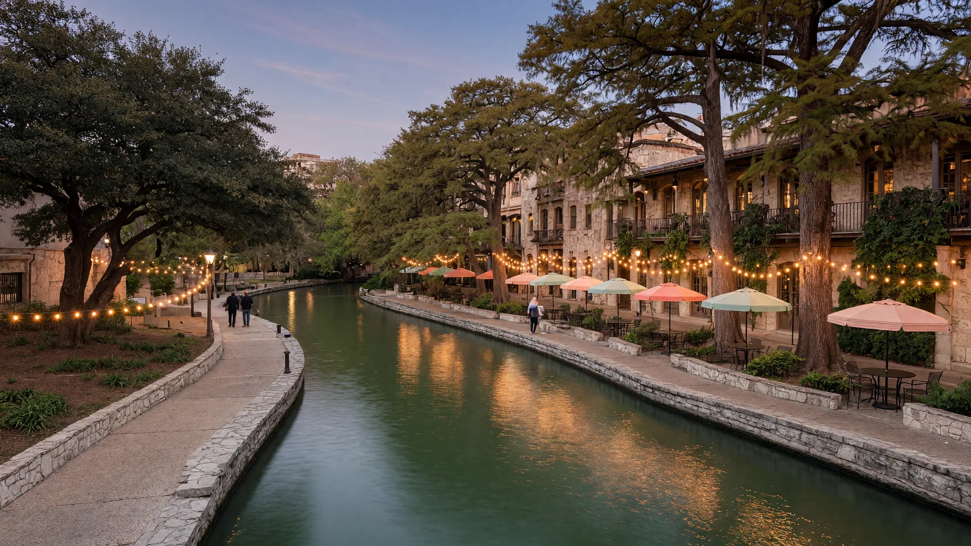 The San Antonio River Walk with cypress trees and lined walkways