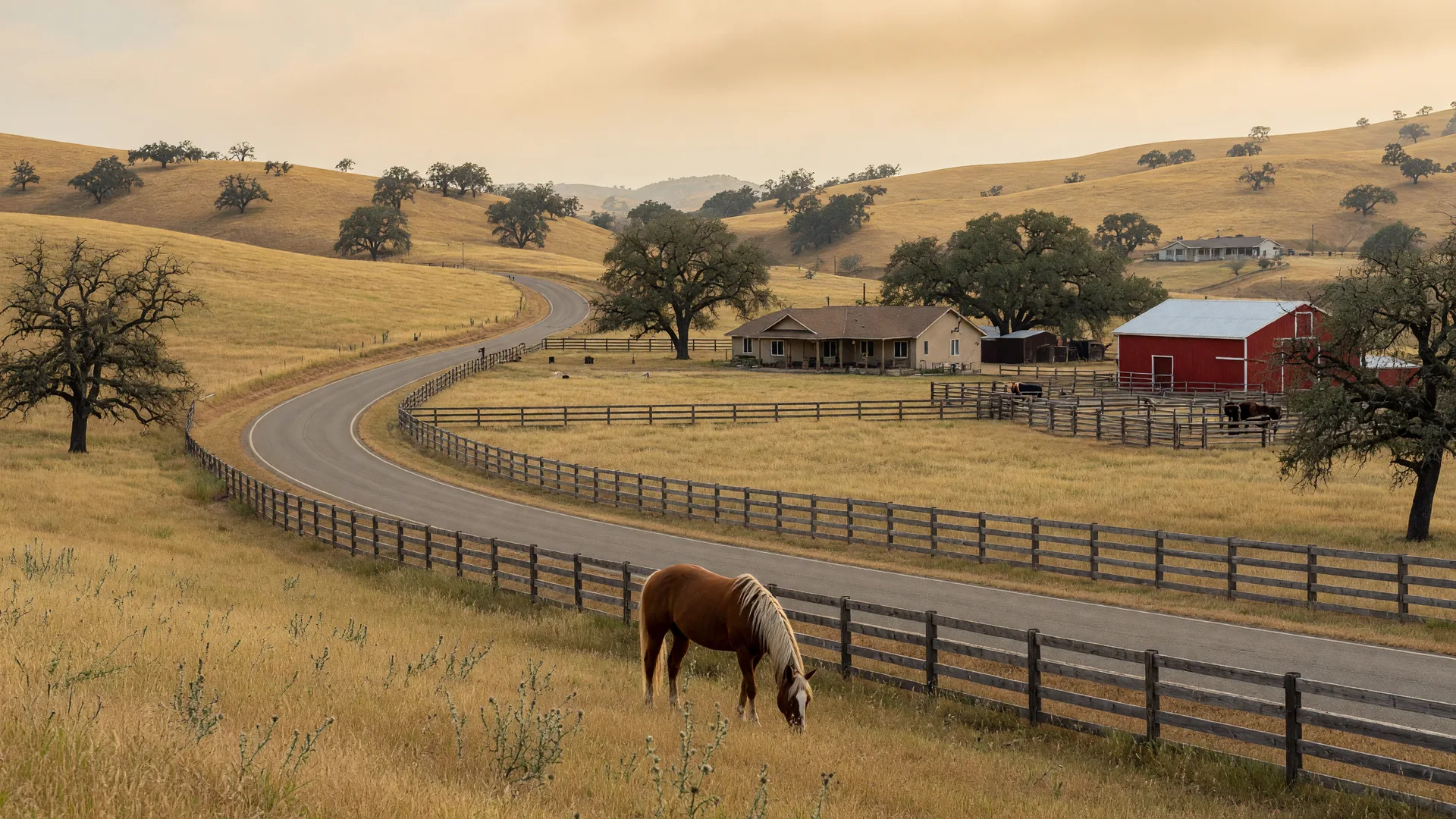Horse country and split-rail fencing on a winding road near Rescue, California