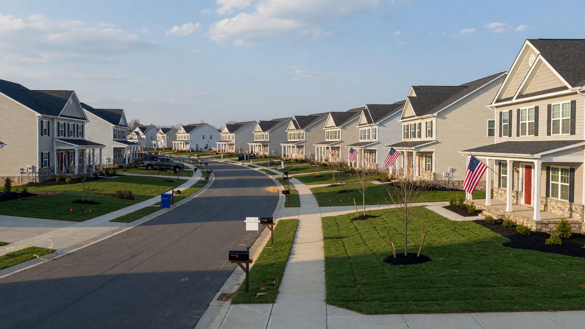 Aerial view of a new construction community in Spotsylvania County, Virginia with newly built homes, sidewalks, and landscaped yards