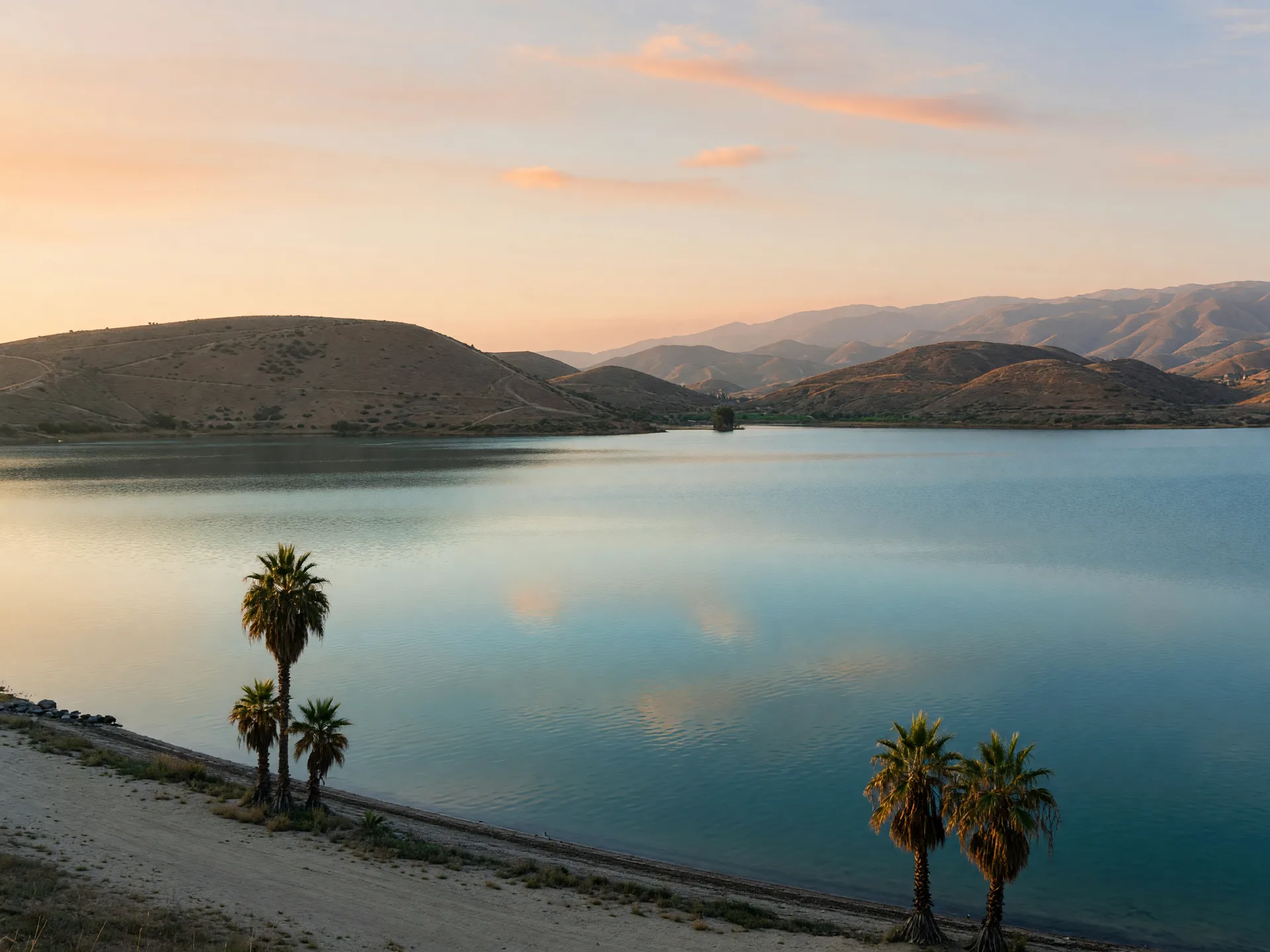 An editorial photograph of Lake Elsinore, California and its surrounding community