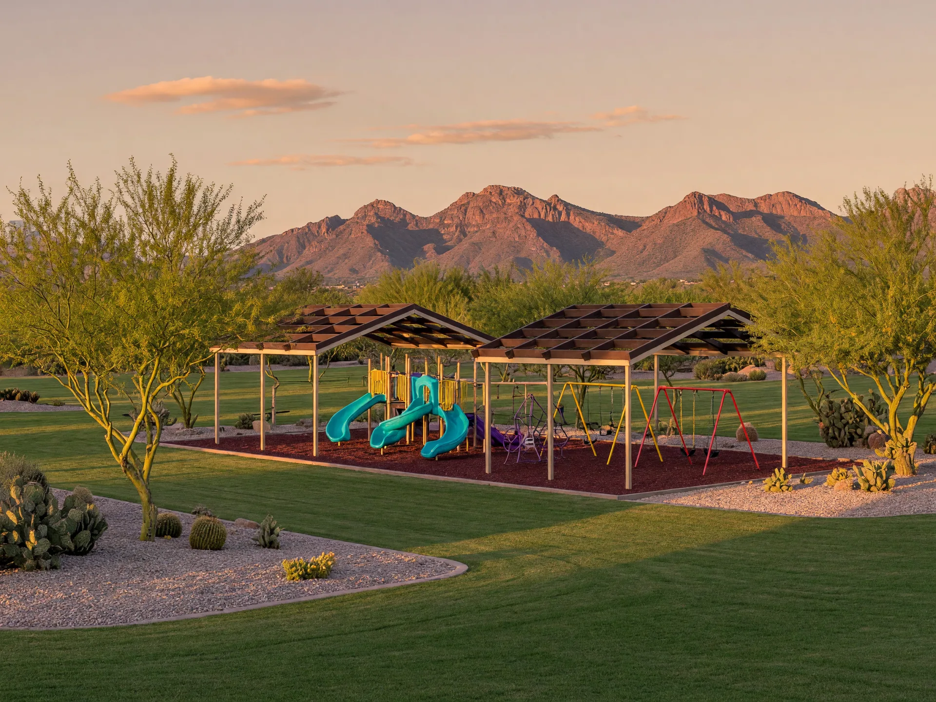 Community park playground in Goodyear with the Estrella mountains in the background
