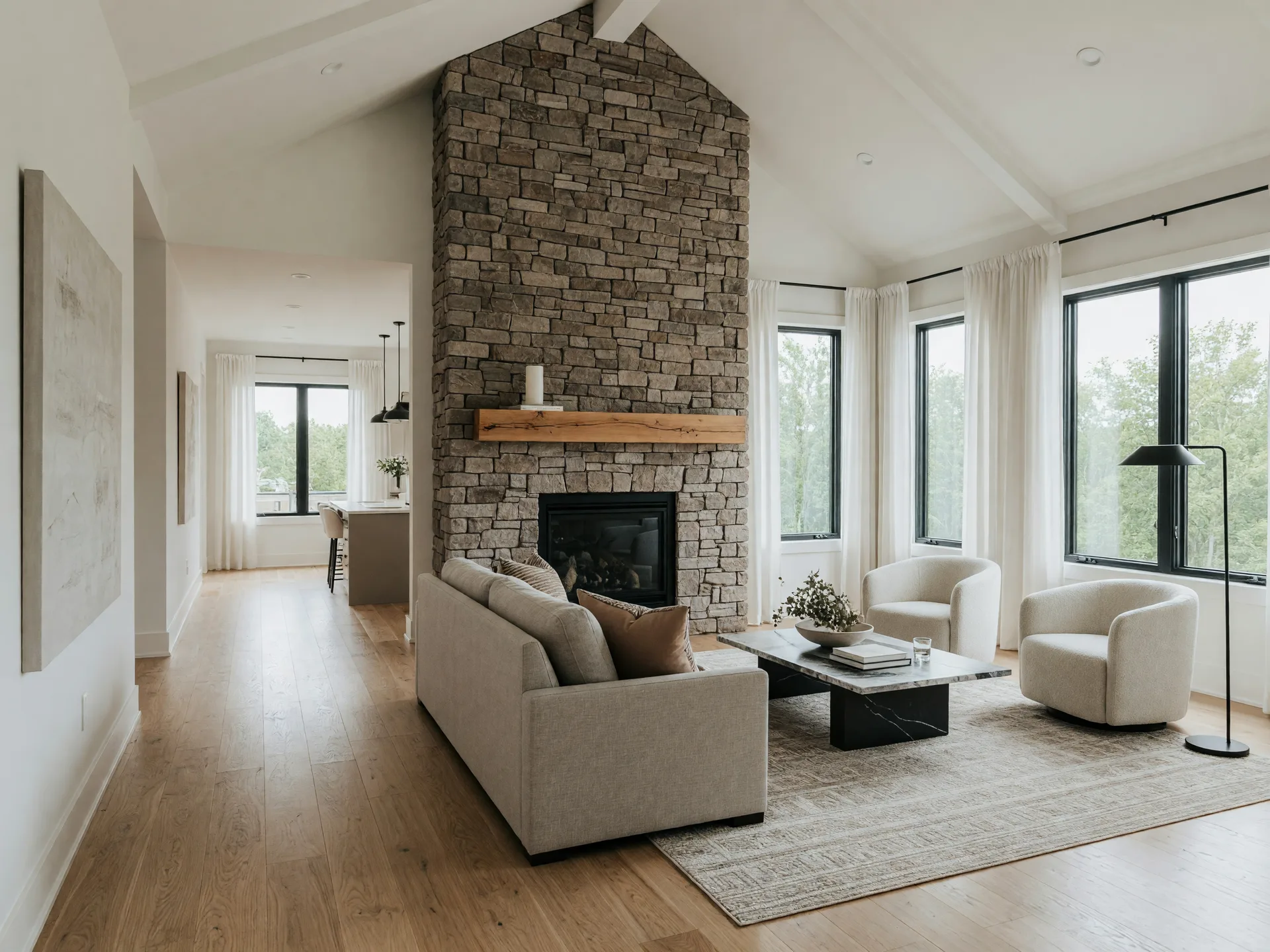 Open-concept living room with a fireplace in a new-construction home at The Preserve community area, Justin, Texas