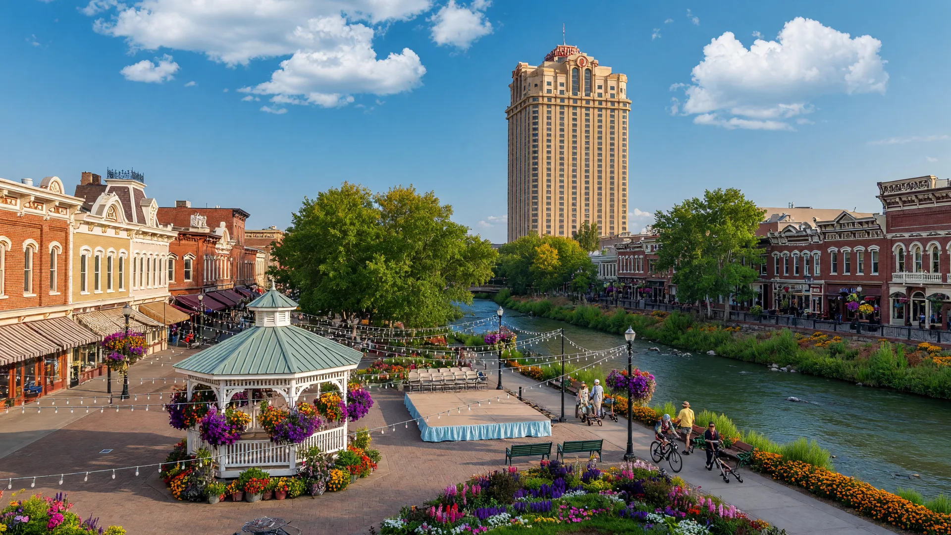 Sparks Nevada's Victorian Square district with the Nugget Casino tower, Victorian architecture, central plaza, and the Truckee River