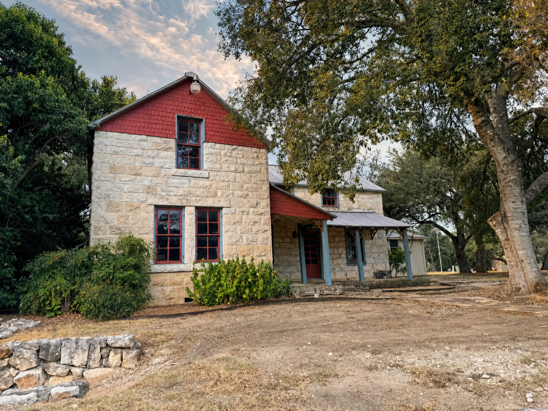 The historic Monken House, a preserved limestone homestead within Balcones Creek.