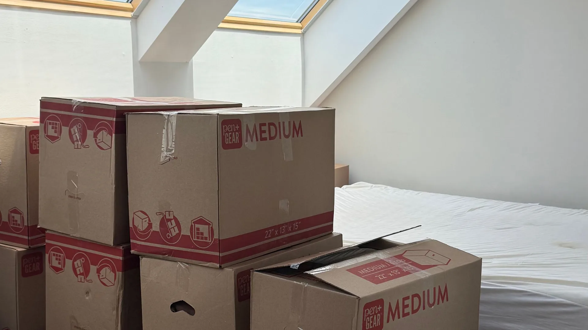 Boxes and packing supplies in a moving truck, ready for a residential move in the Houston area