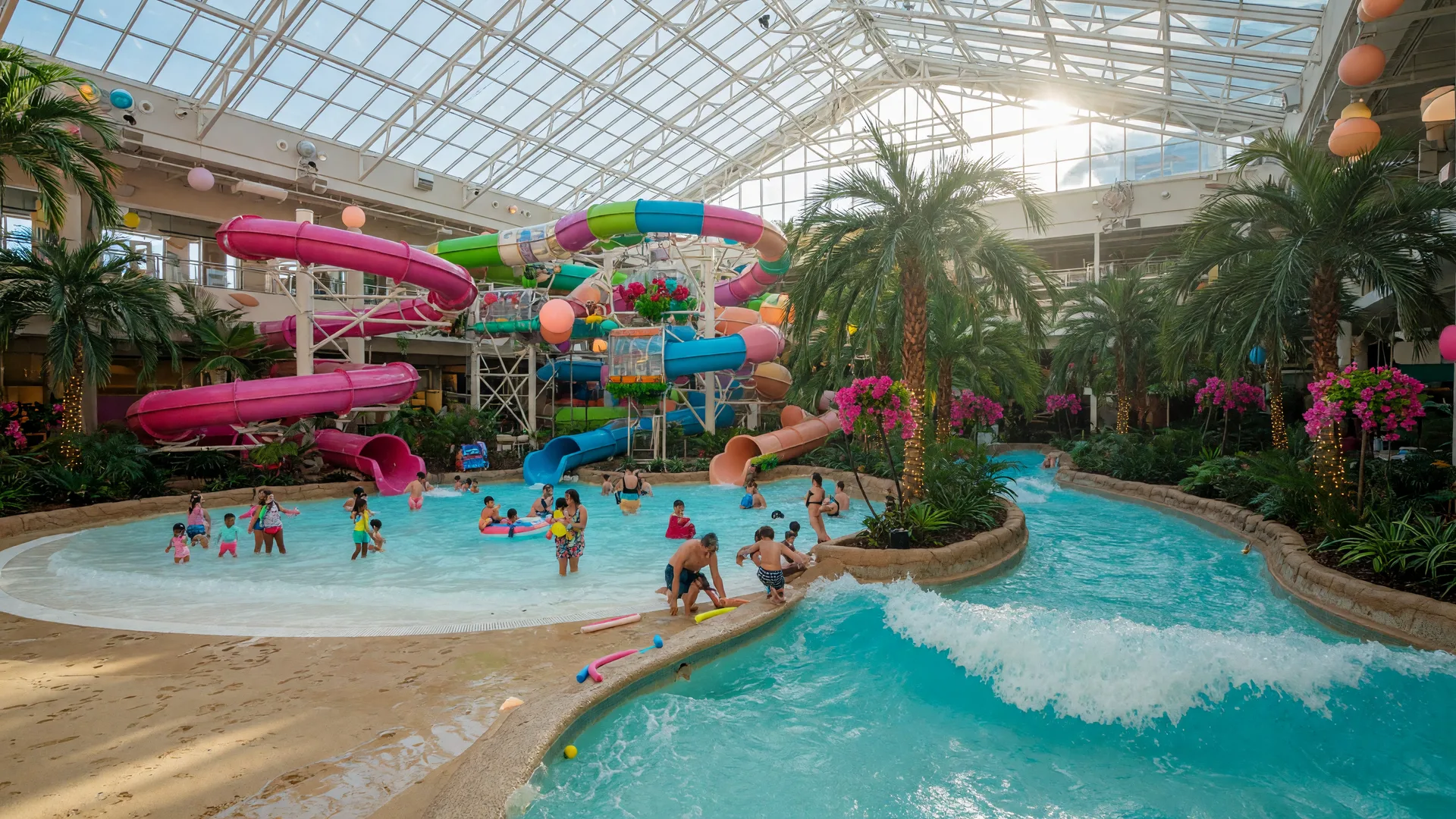 The vast indoor waterpark at Kalahari Resorts in Round Rock under its glass atrium roof