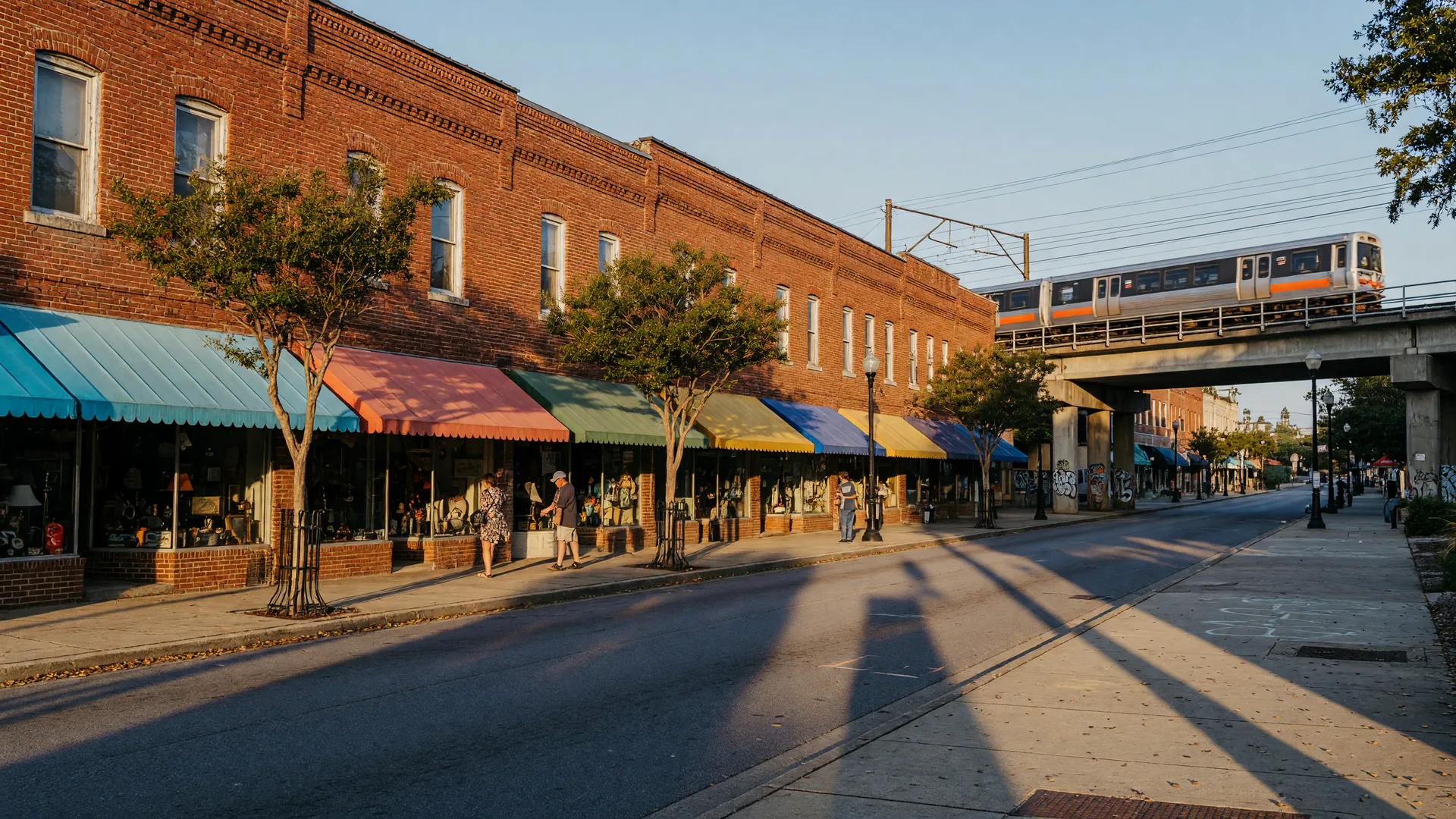Downtown Chamblee Georgia with brick storefronts, antique shops, and the MARTA Gold Line in the distance