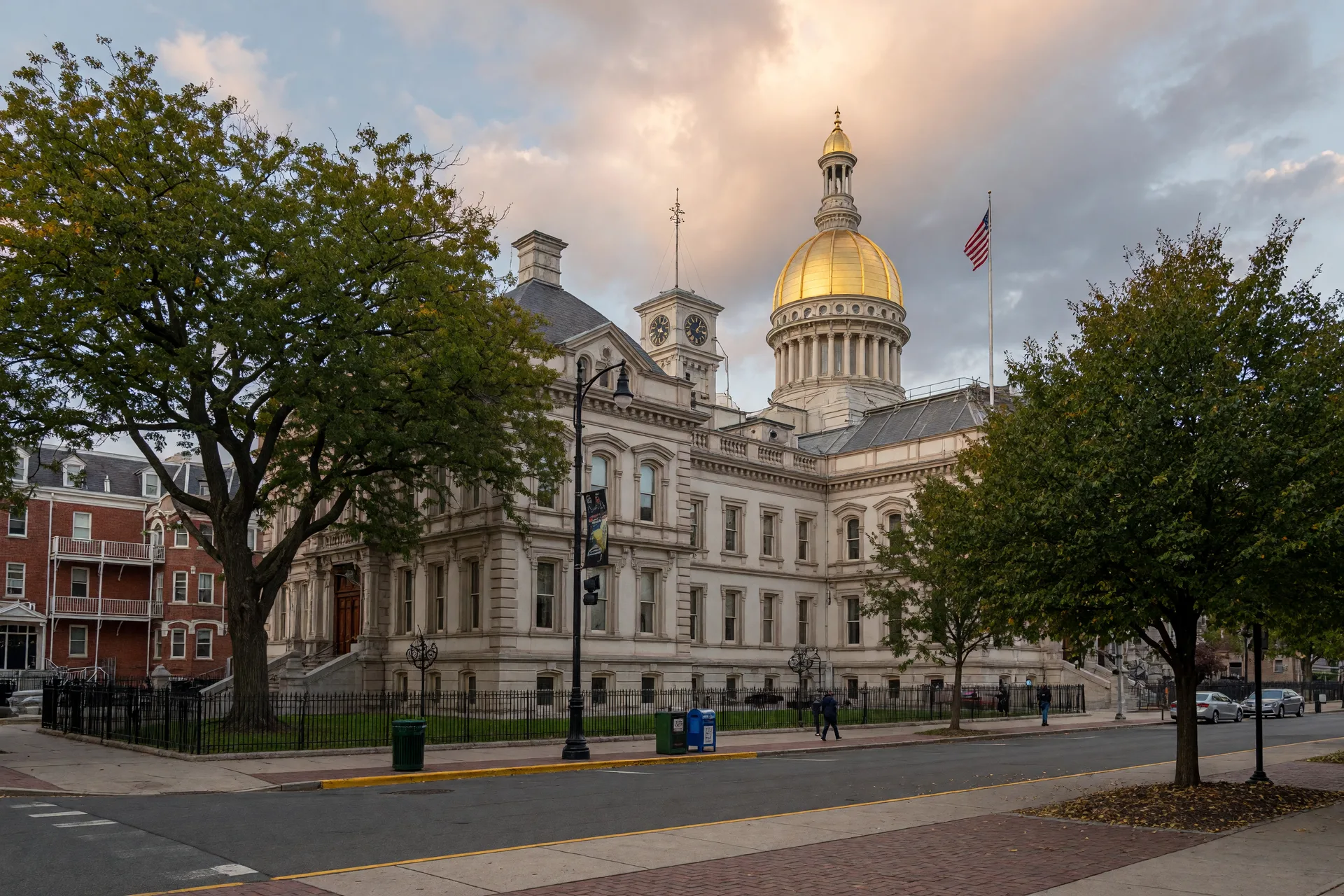 New Jersey State House in Trenton with its iconic gold dome, captured on an overcast afternoon