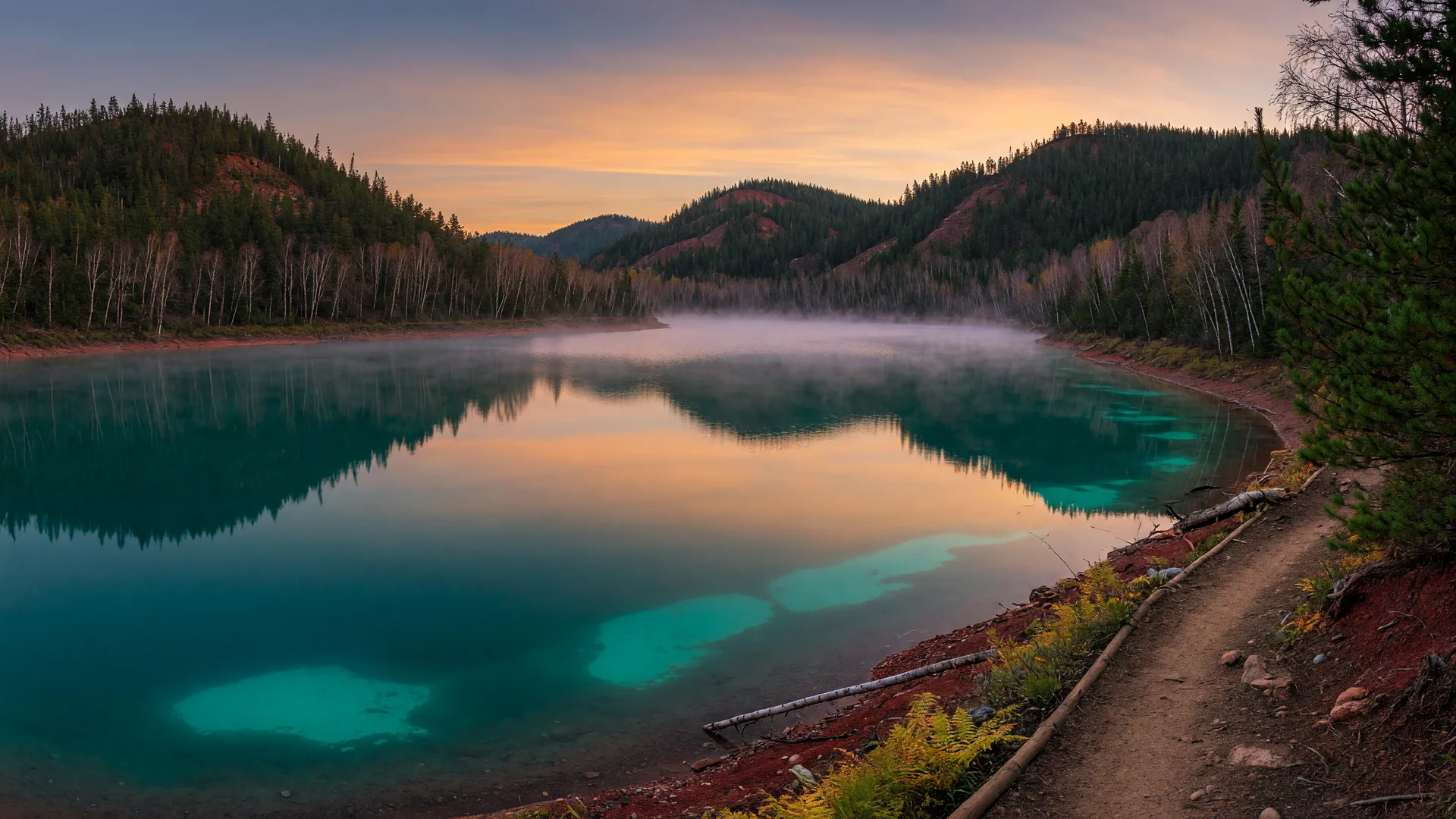 Turquoise former mine lake in the Cuyuna country near Ironton at dusk