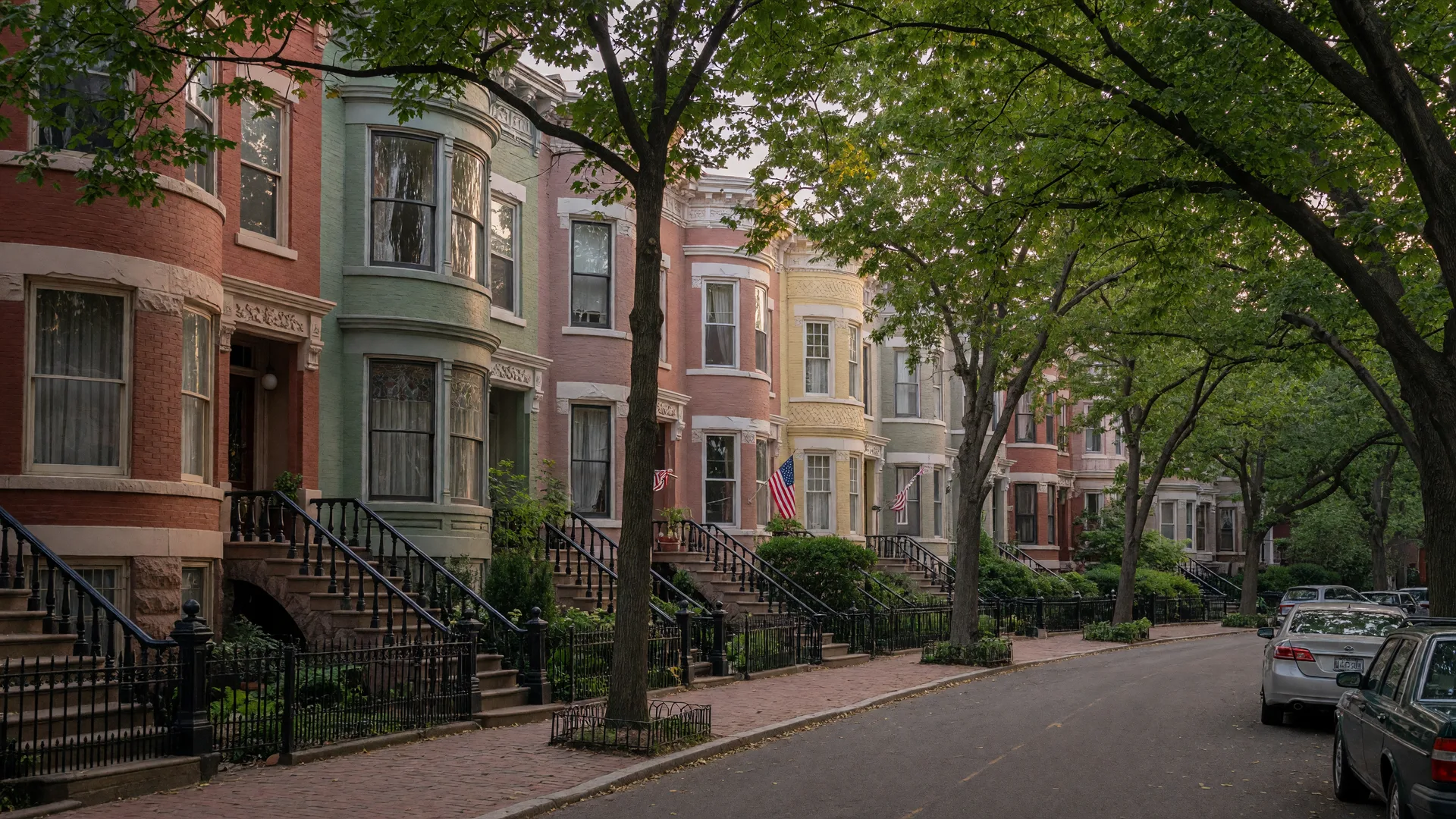 A tree-lined Arlington street with mix of homes and rowhouses