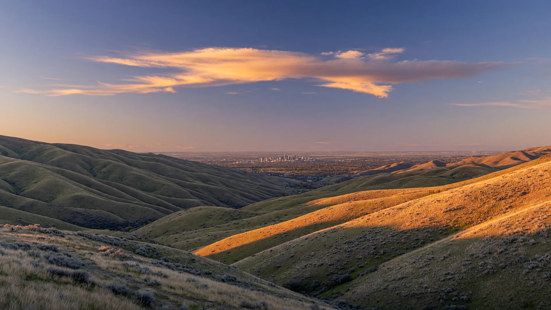 Golden-hour view across the Boise foothills toward the Treasure Valley