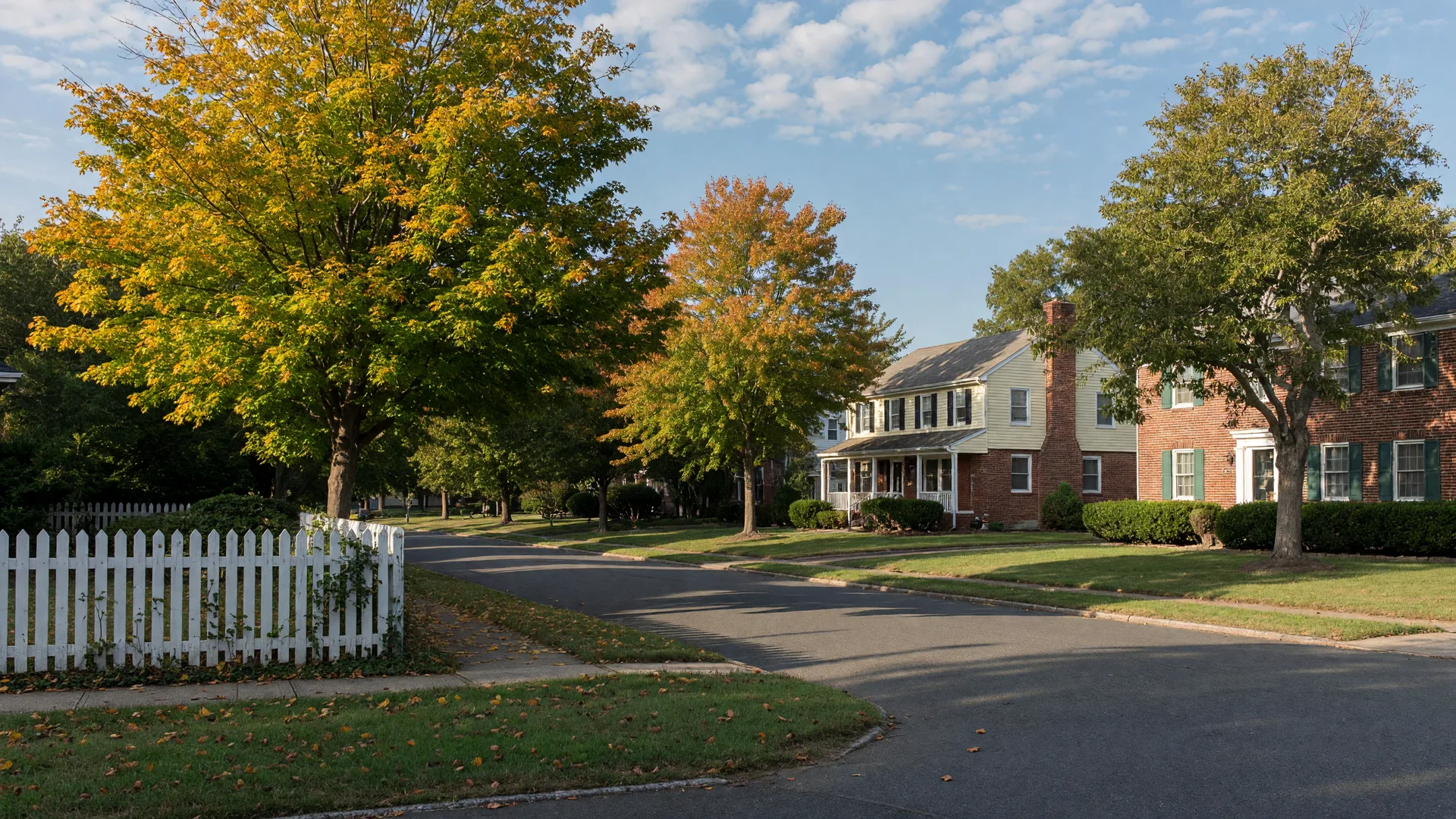 Leafy suburban street in Burlington County, South Jersey on a clear early-autumn afternoon