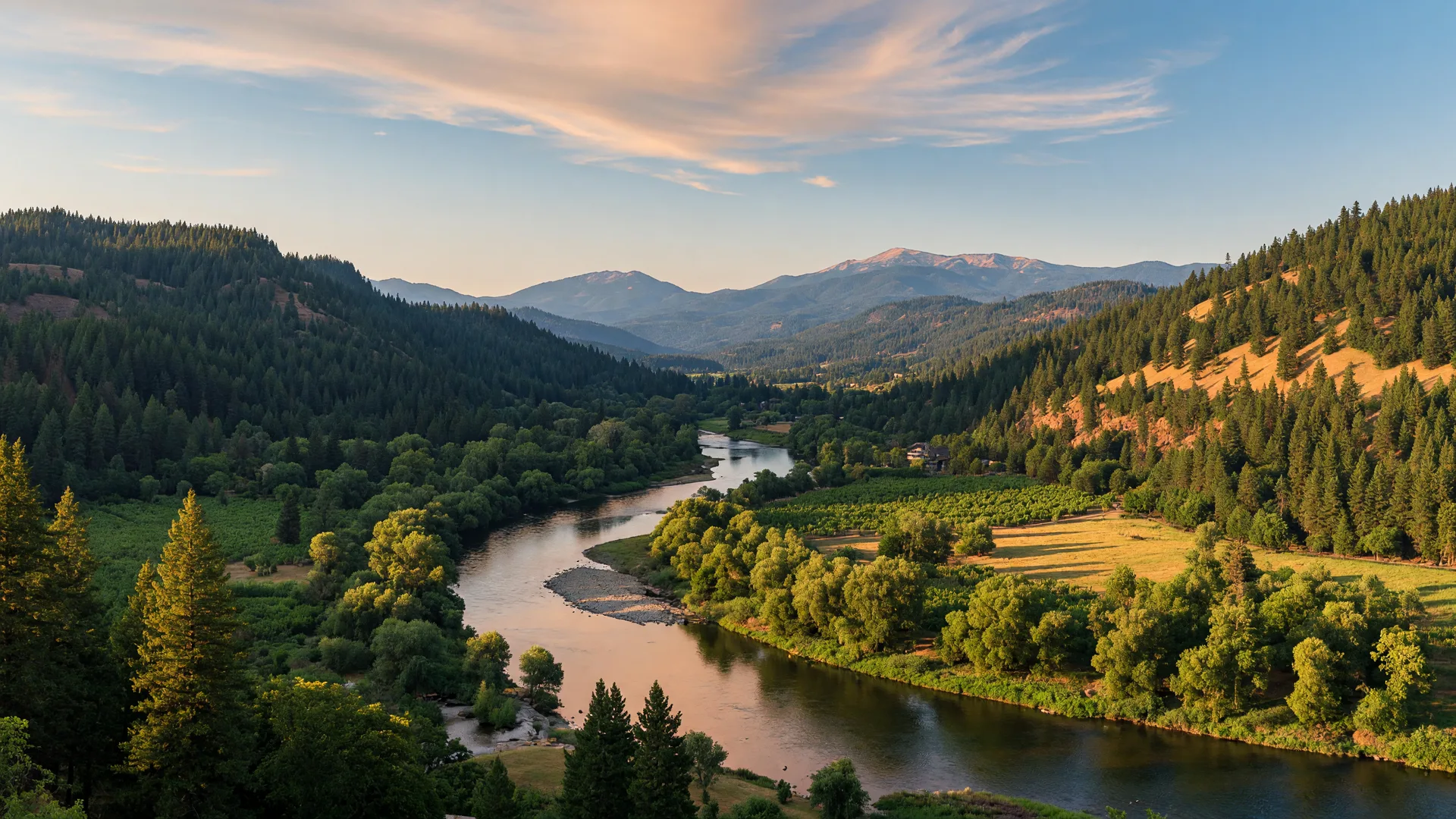 Rogue Valley landscape with rolling hills and river view