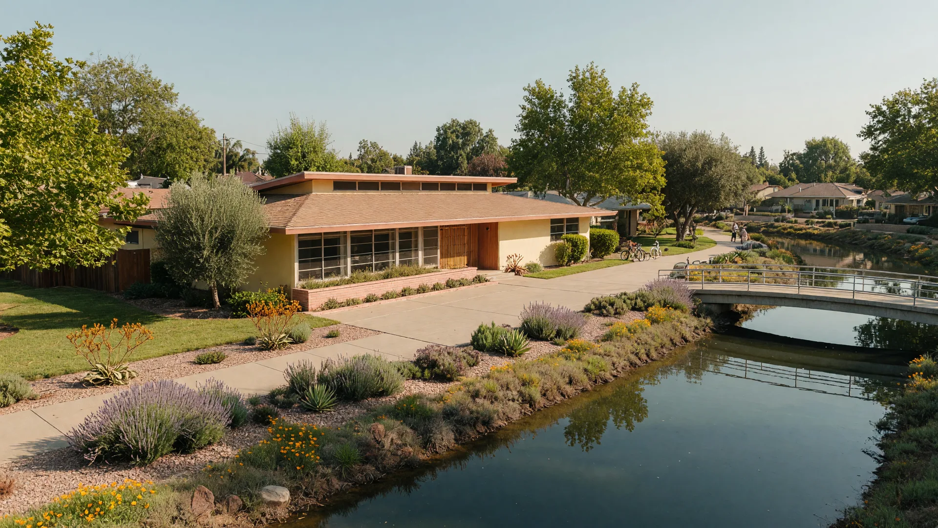 A mid-century Greenhaven home with a calm canal and pedestrian bridge in the background