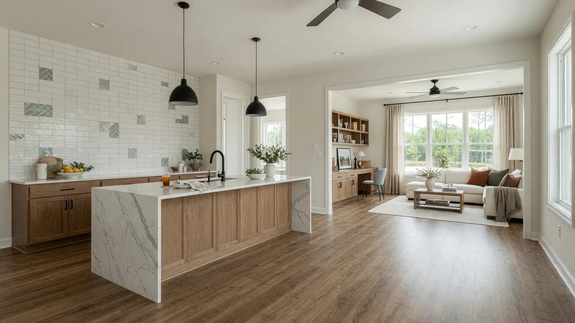 Bright open-concept new construction home in Virginia with a quartz waterfall kitchen island, warm wood cabinetry, and a flex room office nook